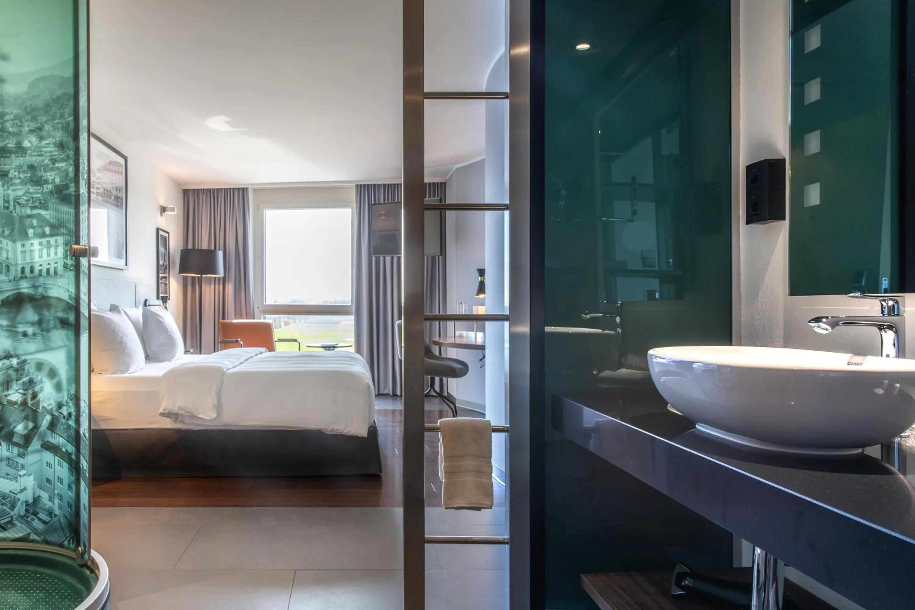 Bathroom, Bed in Radisson Hotel Zurich Airport