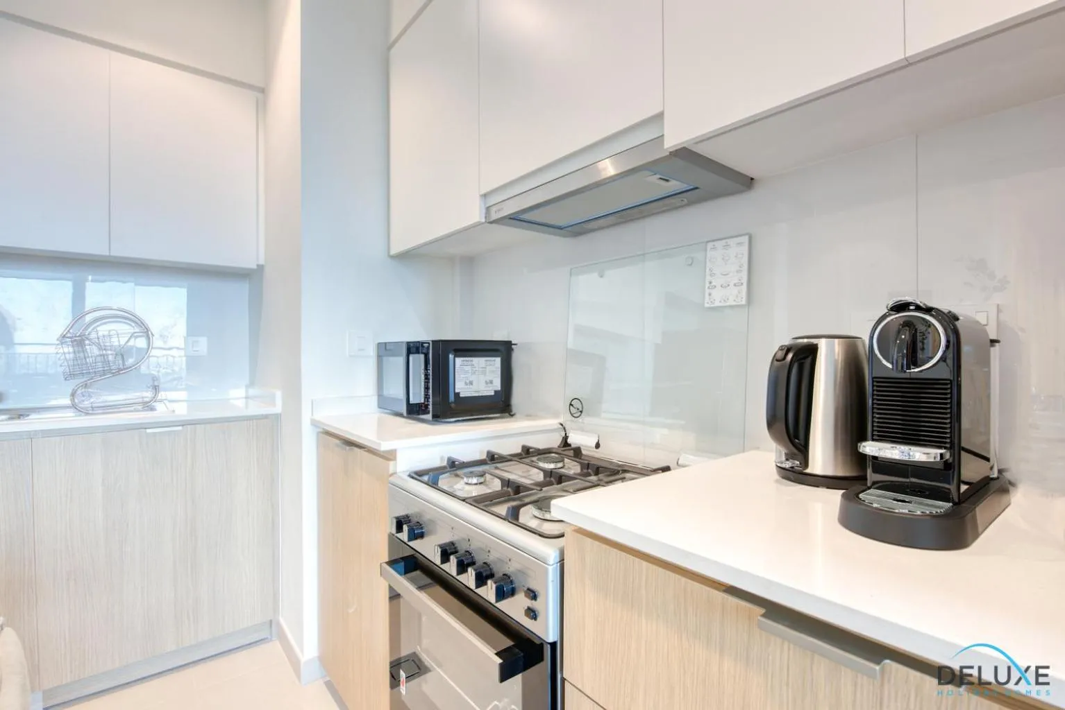 Kitchen or kitchenette in Community Living 2BR Close to Emirates Golf Club, Golf Views A, Madinat Al Mataar by Deluxe Holiday Homes