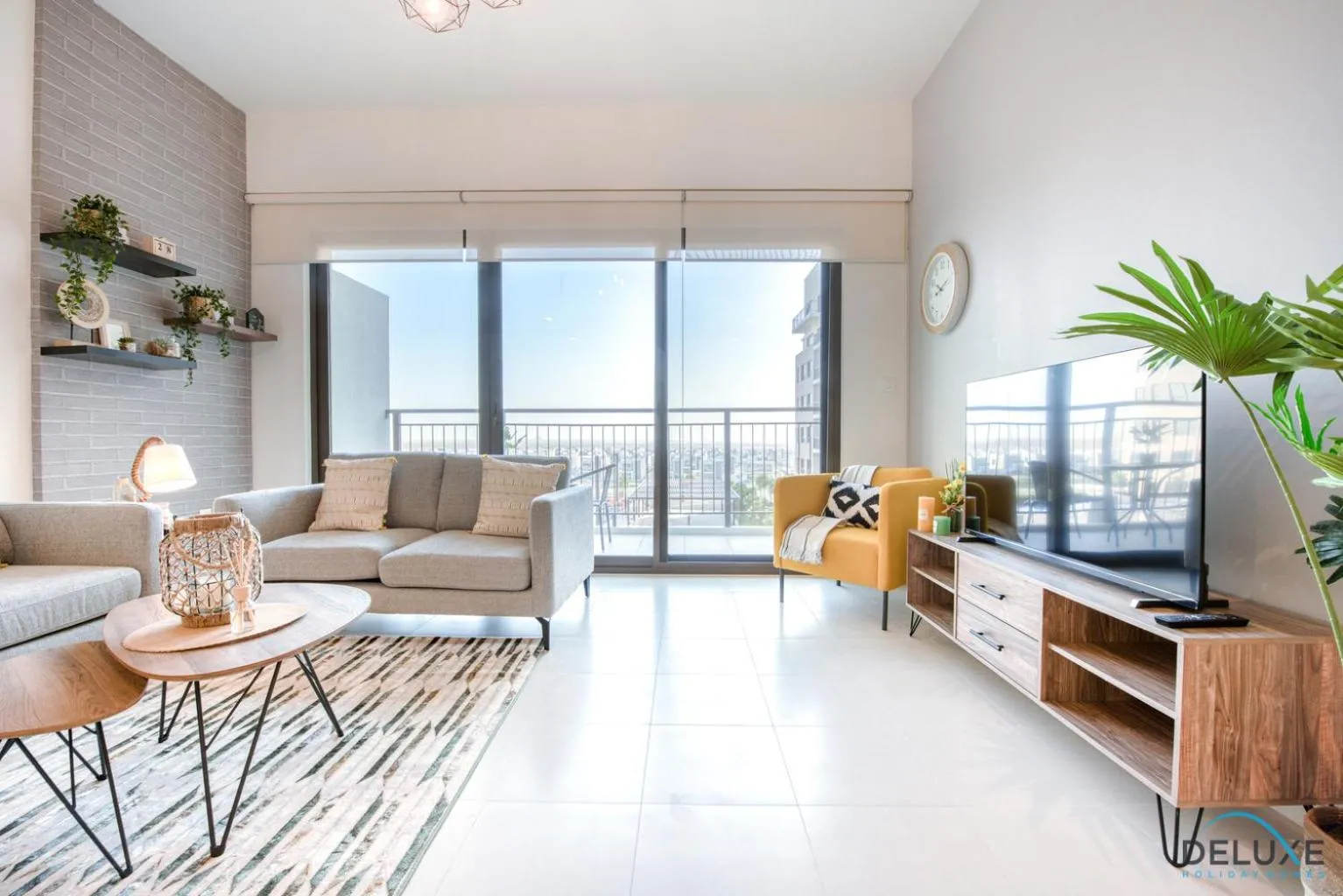 Living room in Community Living 2BR Close to Emirates Golf Club, Golf Views A, Madinat Al Mataar by Deluxe Holiday Homes