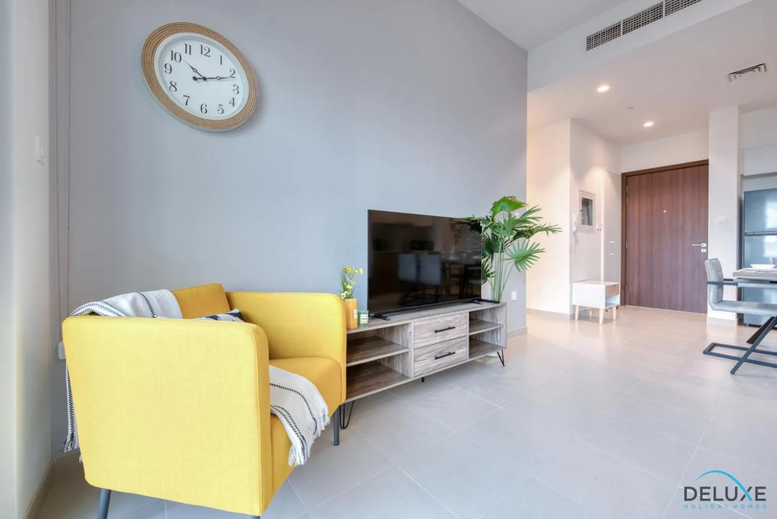 TV and multimedia in Community Living 2BR Close to Emirates Golf Club, Golf Views A, Madinat Al Mataar by Deluxe Holiday Homes