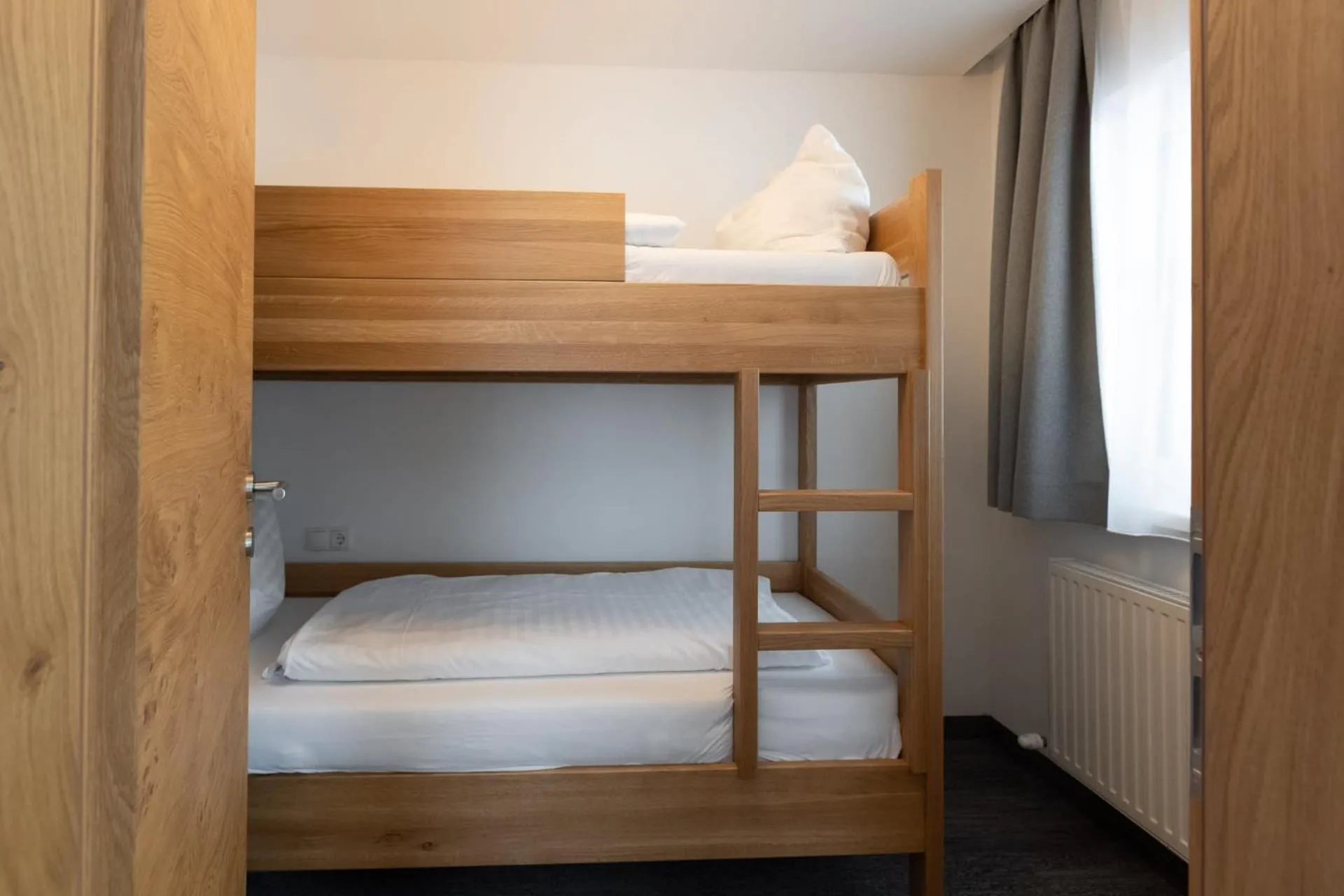 Photo of the whole room, Bed in Wander- und Familienhotel Erika