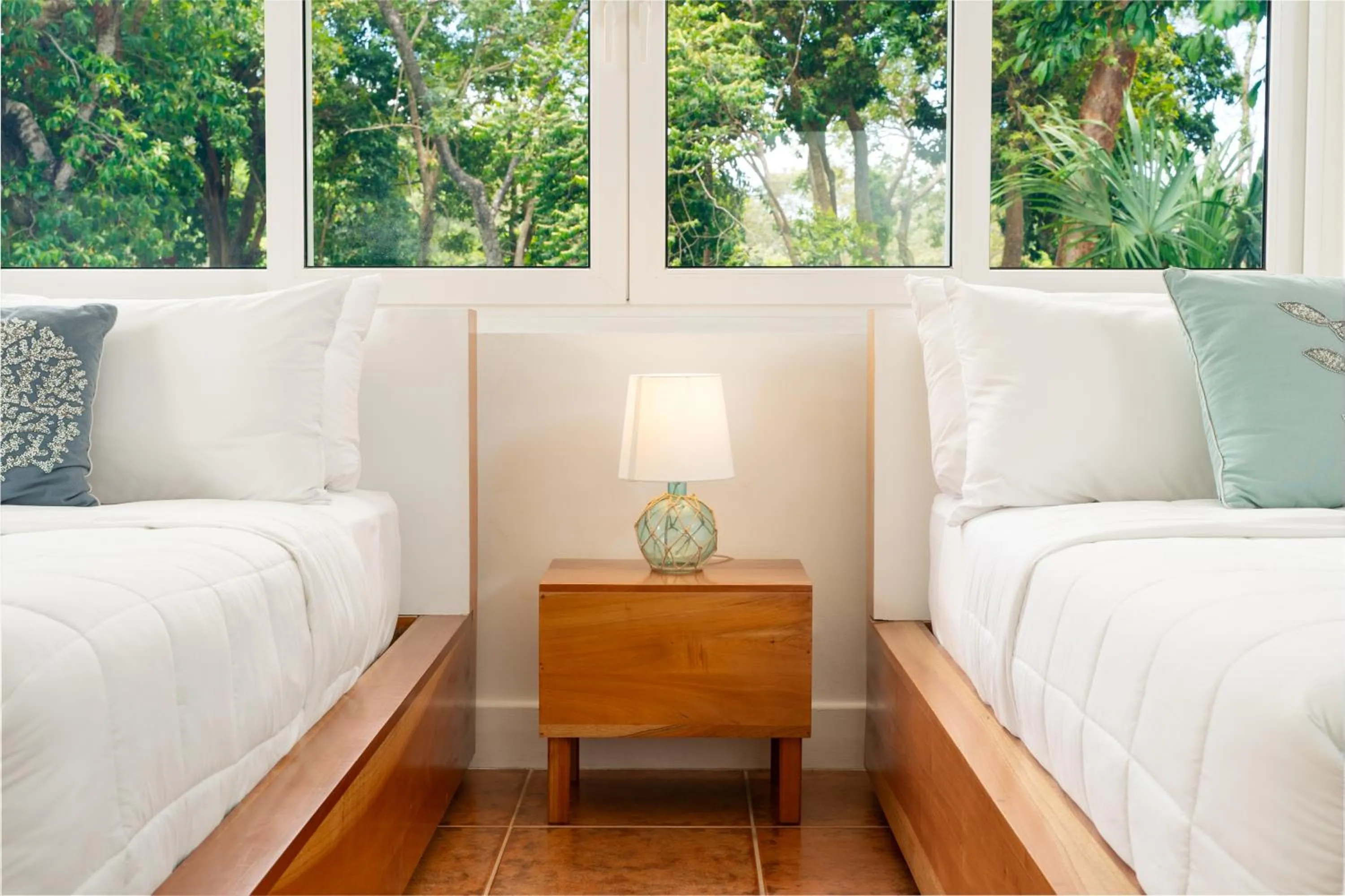 Bed in Blue Roatan Resort