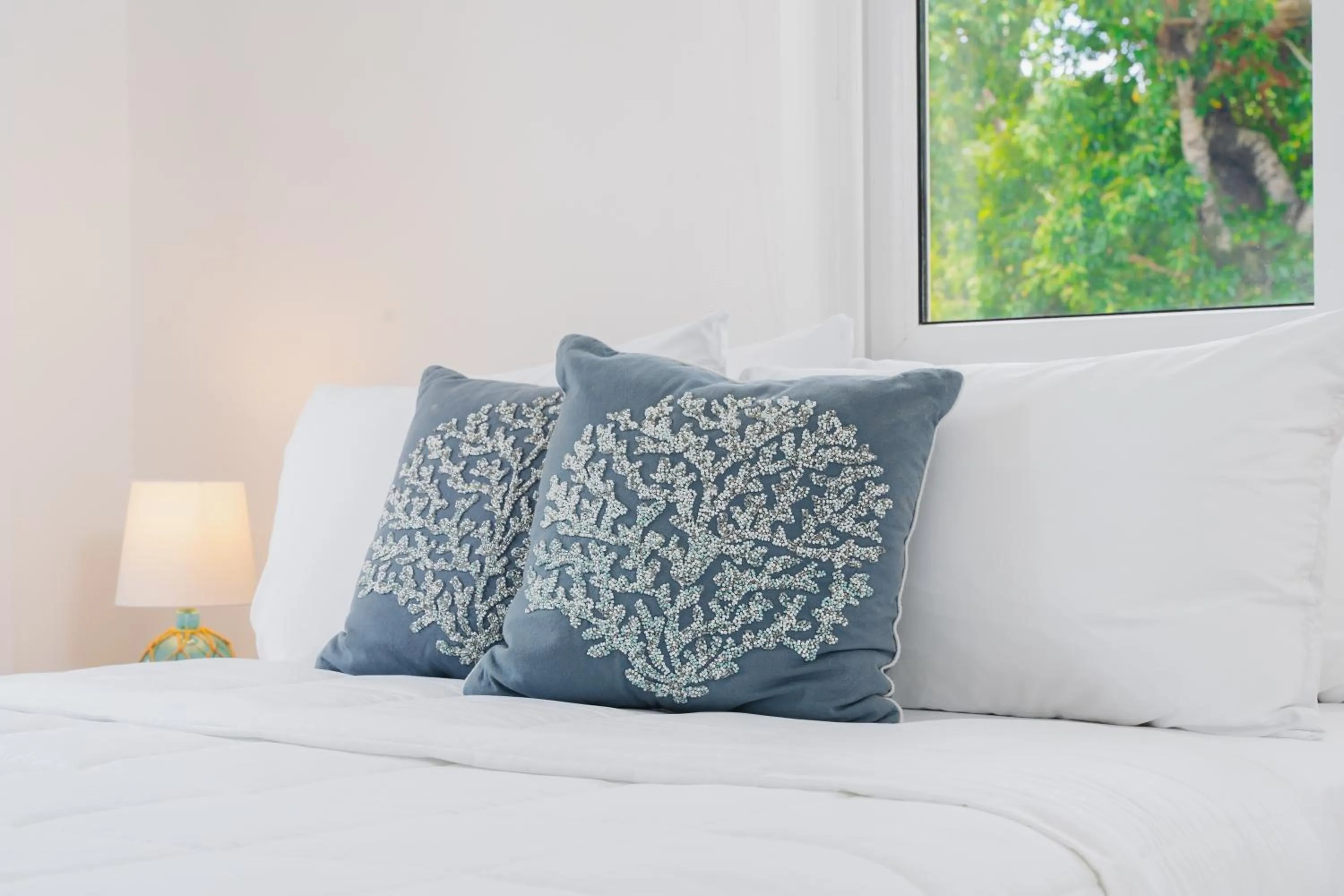 Bed in Blue Roatan Resort