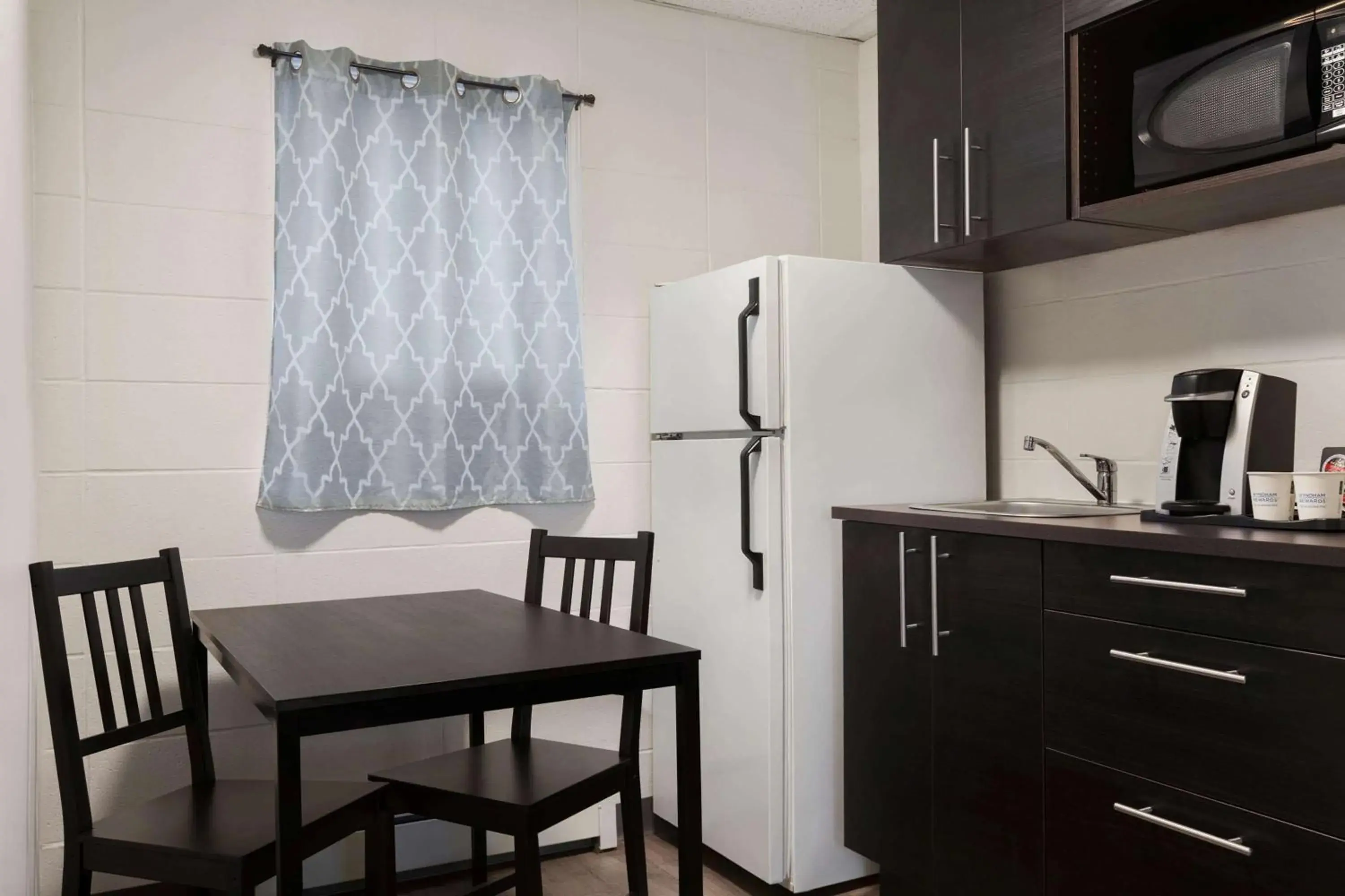 Bedroom in Howard Johnson by Wyndham Grande Prairie Bedroom in Howard Johnson by Wyndham Grande Prairie