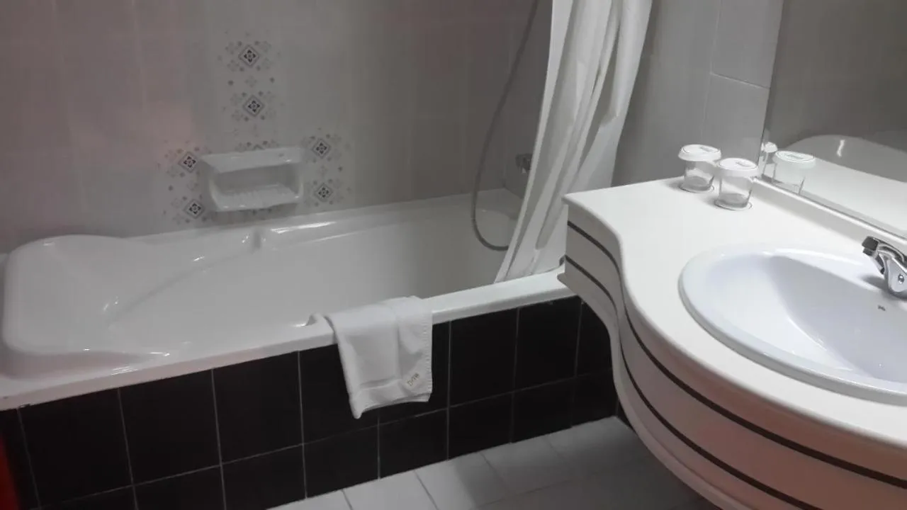 Bathroom in Dubai Grand Hotel by Fortune, Dubai Airport