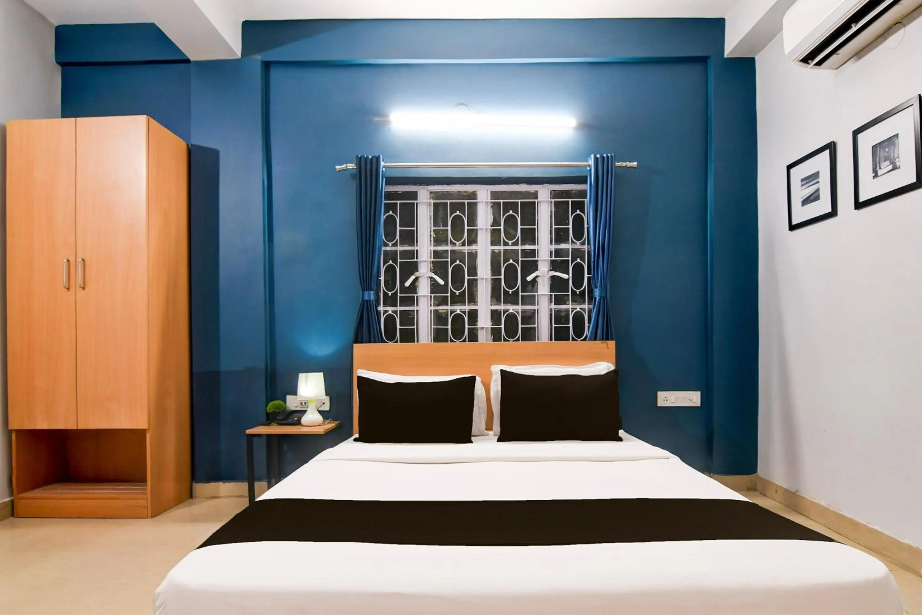 Bedroom, Bed in Super Hotel O Picnic Garden formerly Amaris Stay