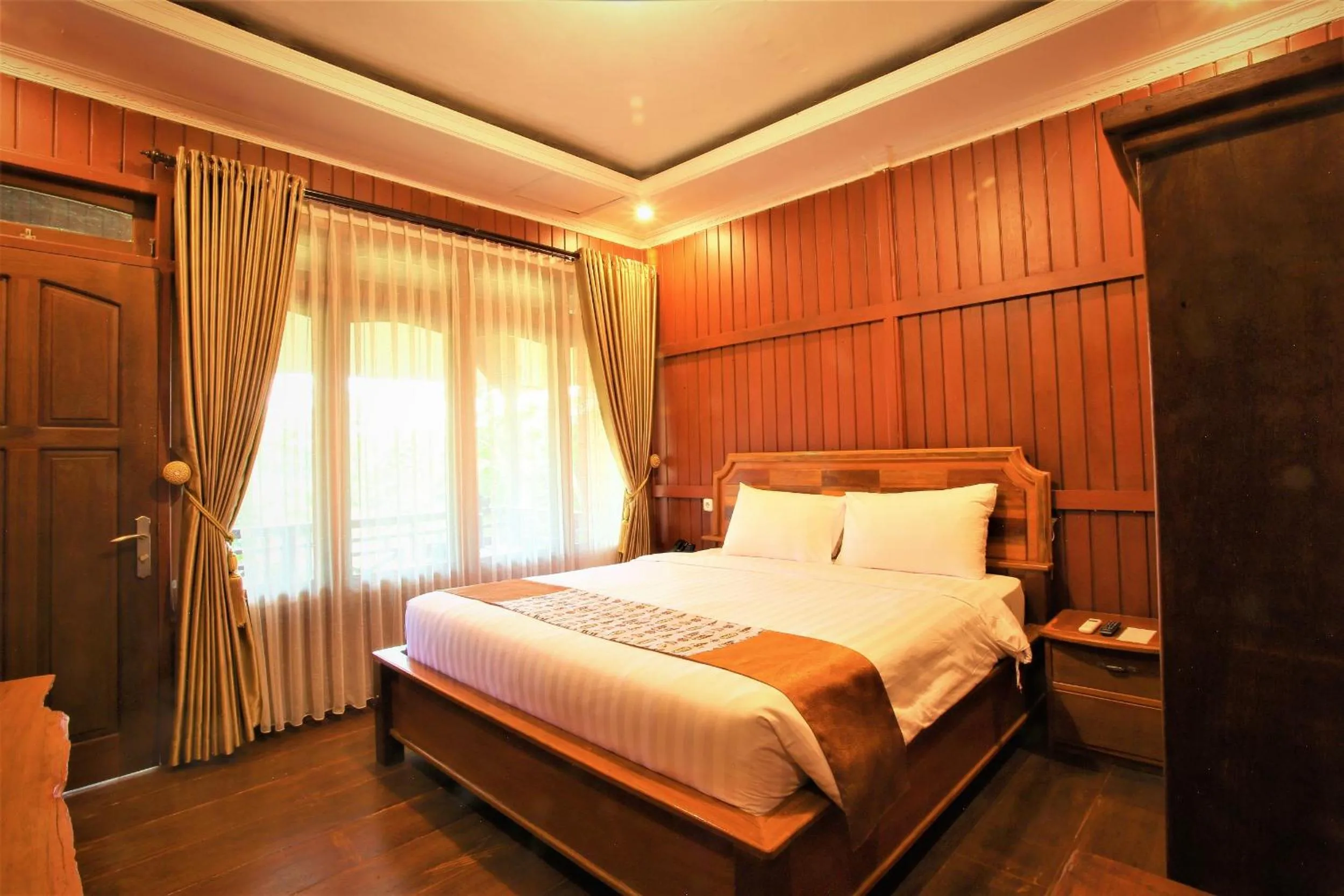 Bed in Kasuari Exotic Resort Magelang