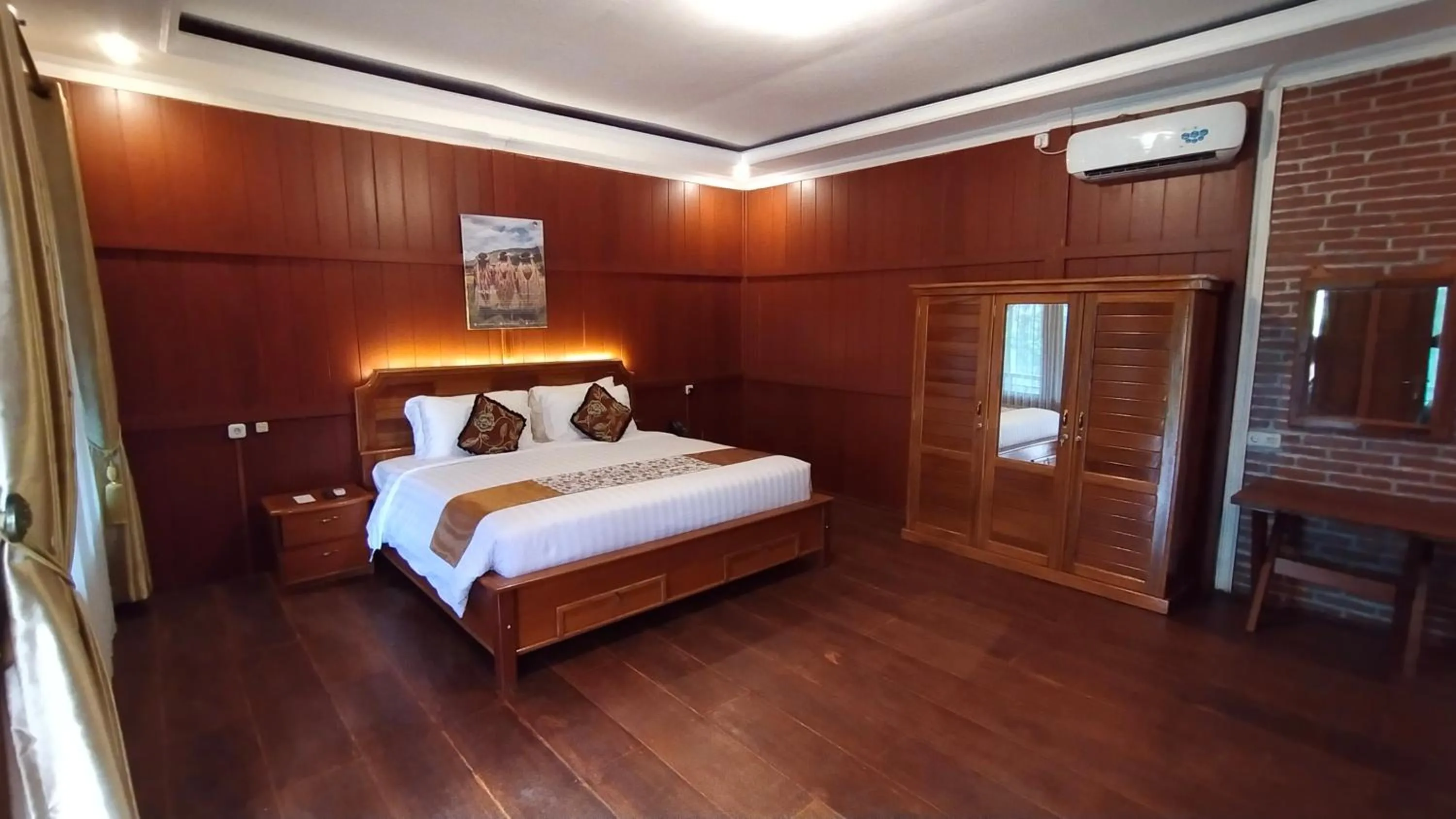 Bed in Kasuari Exotic Resort Magelang