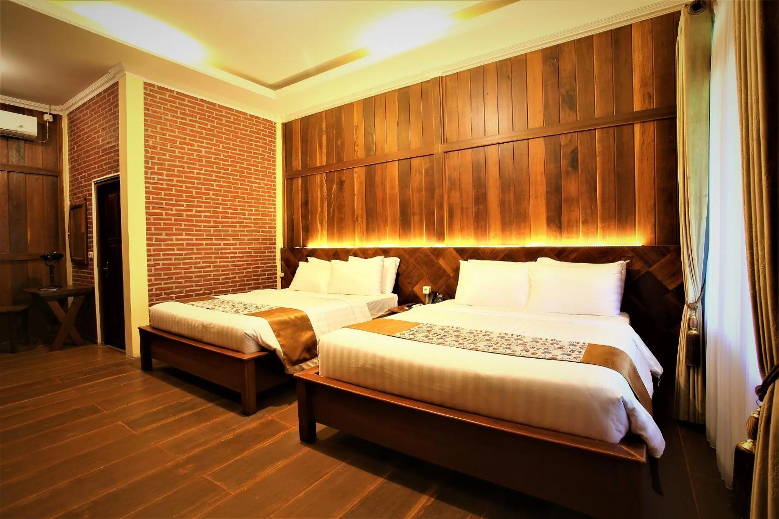 Bed in Kasuari Exotic Resort Magelang