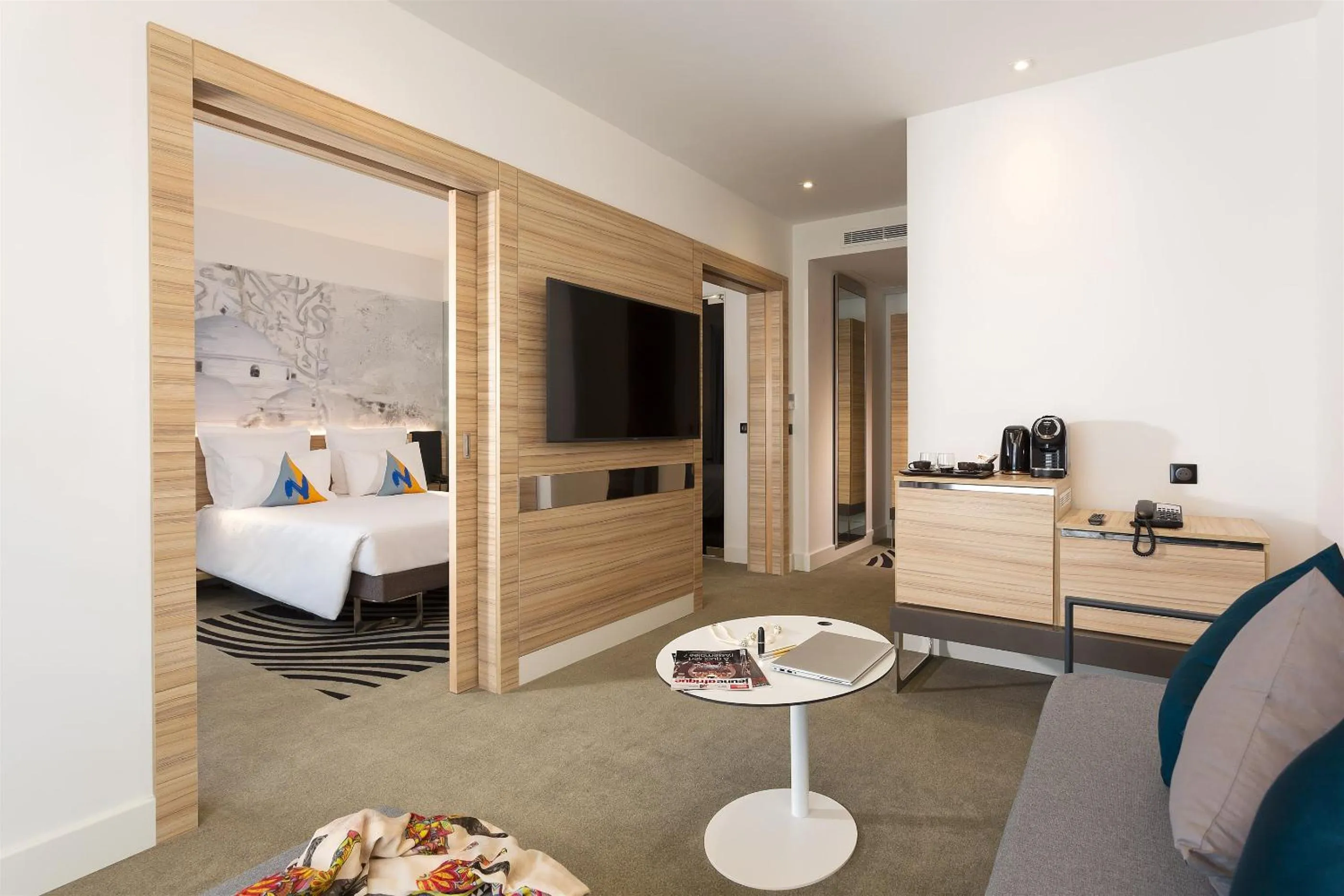 Communal lounge/ TV room, Bed in Novotel Tunis Lac