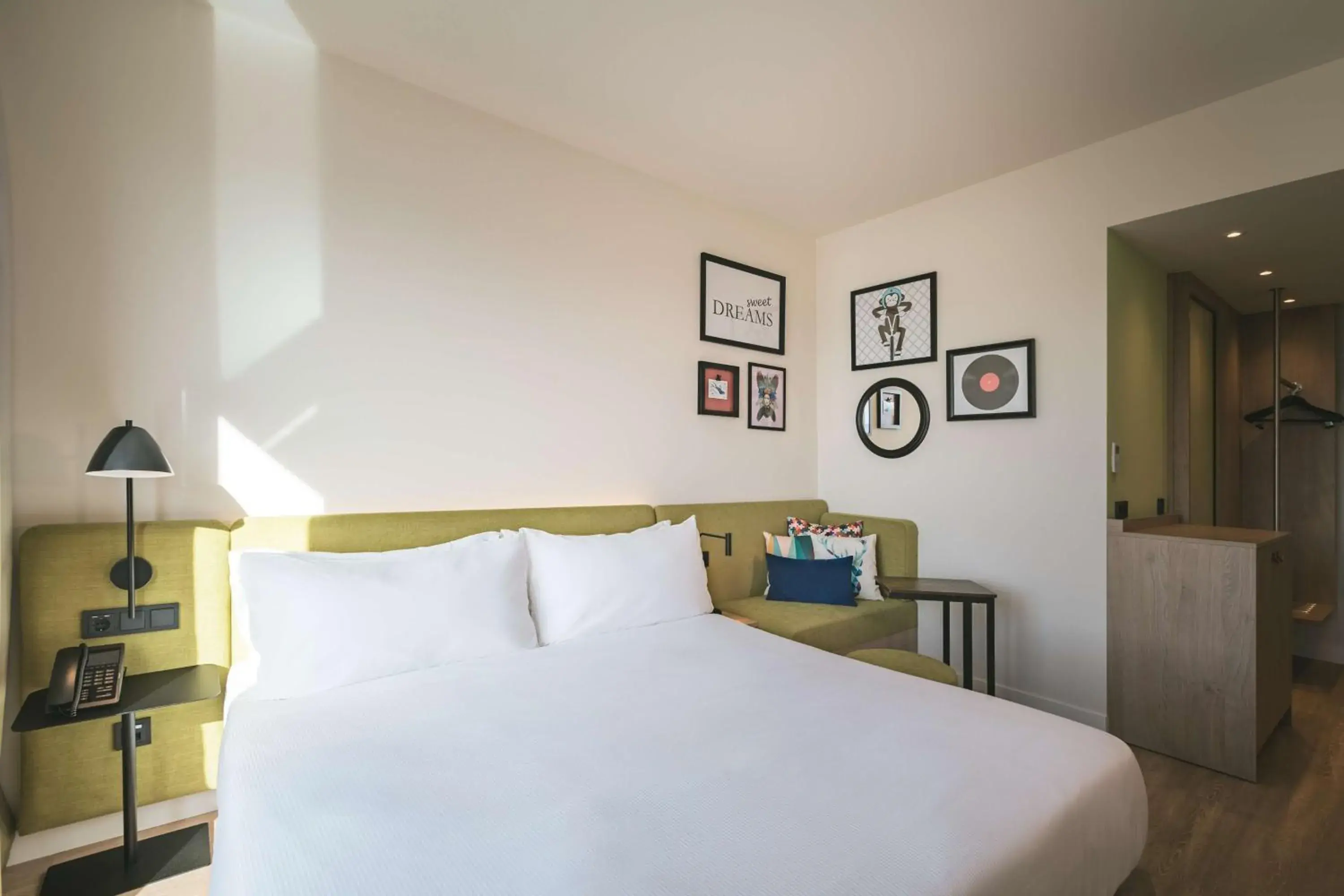 Living room, Bed in Hampton by Hilton Konstanz Living room, Bed in Hampton by Hilton Konstanz