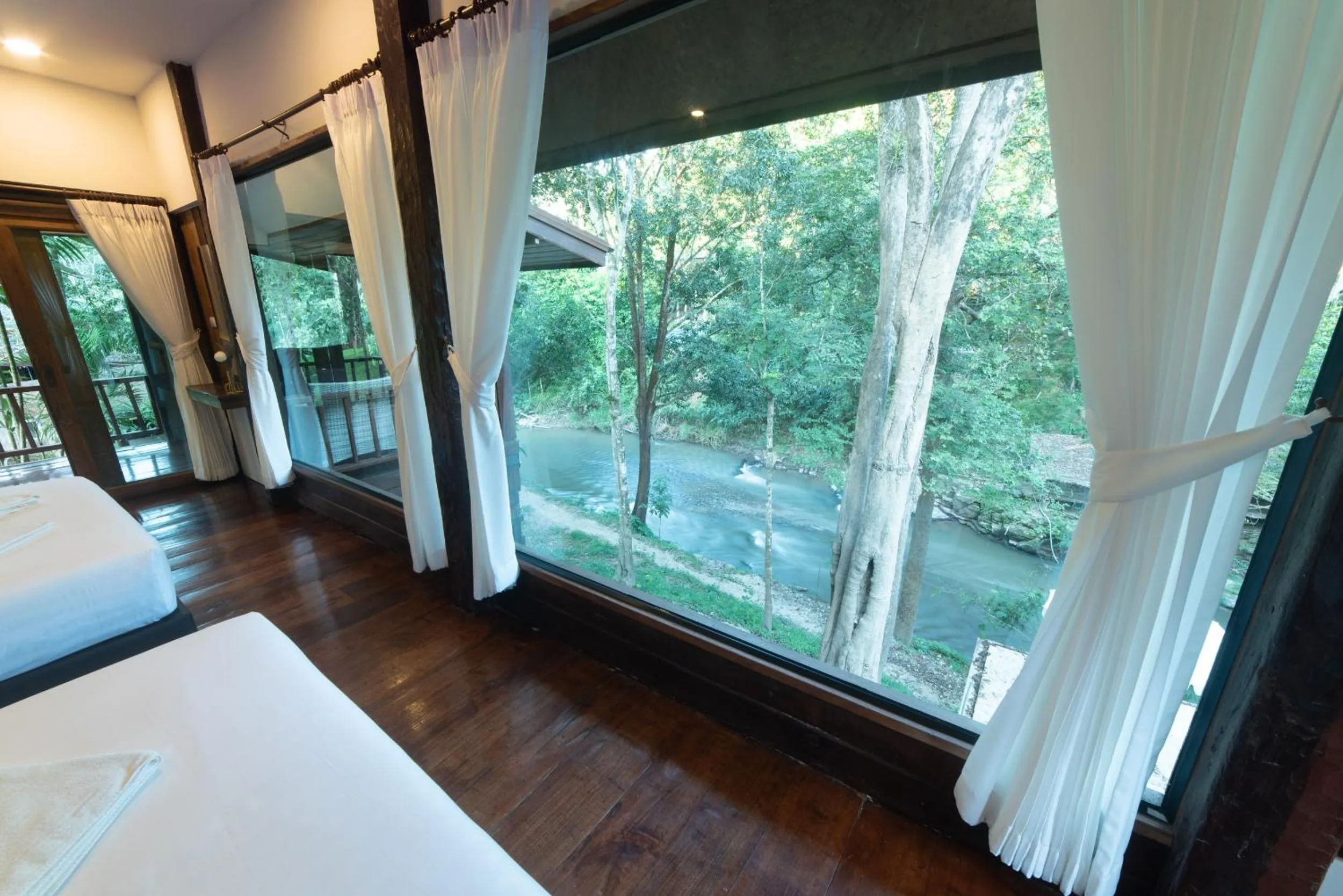 View (from property/room), Bed in Tawan Riverside