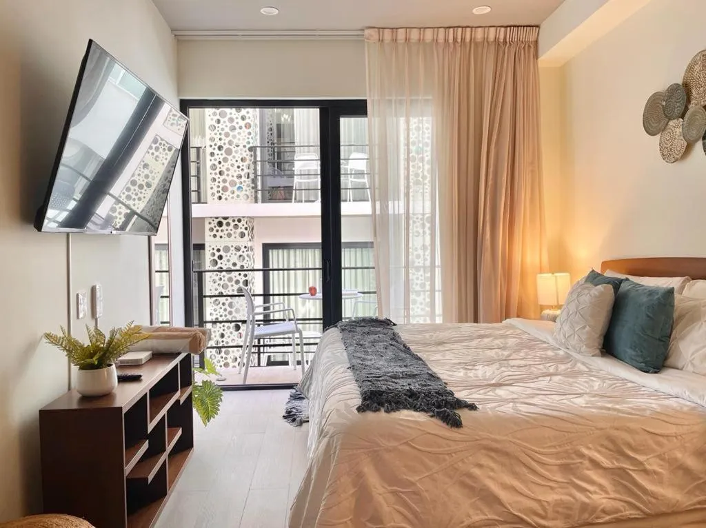 Bed in The Boat Condo by Andiani Travel