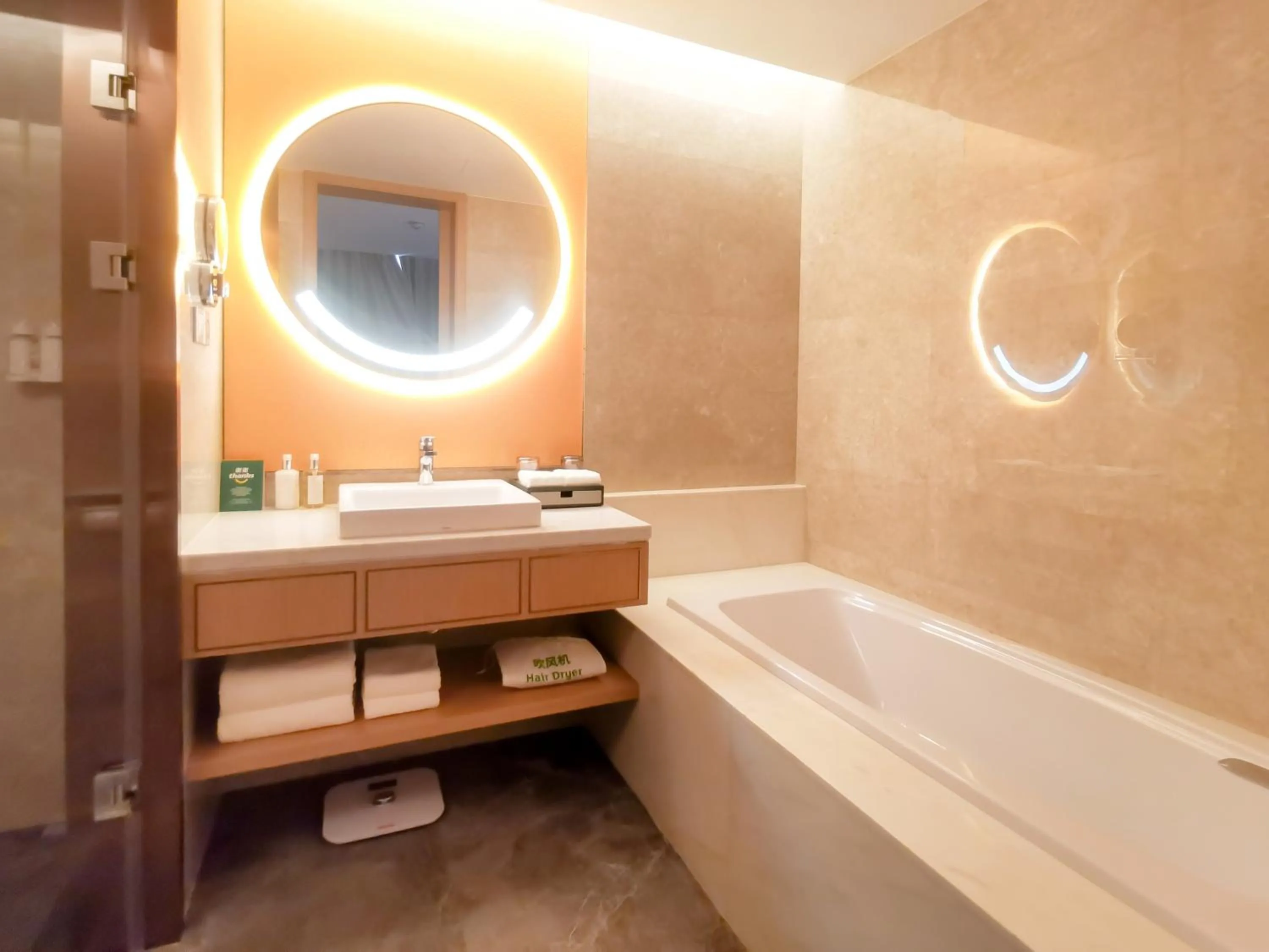Bathroom in Holiday Inn Luzhou Longjian by IHG