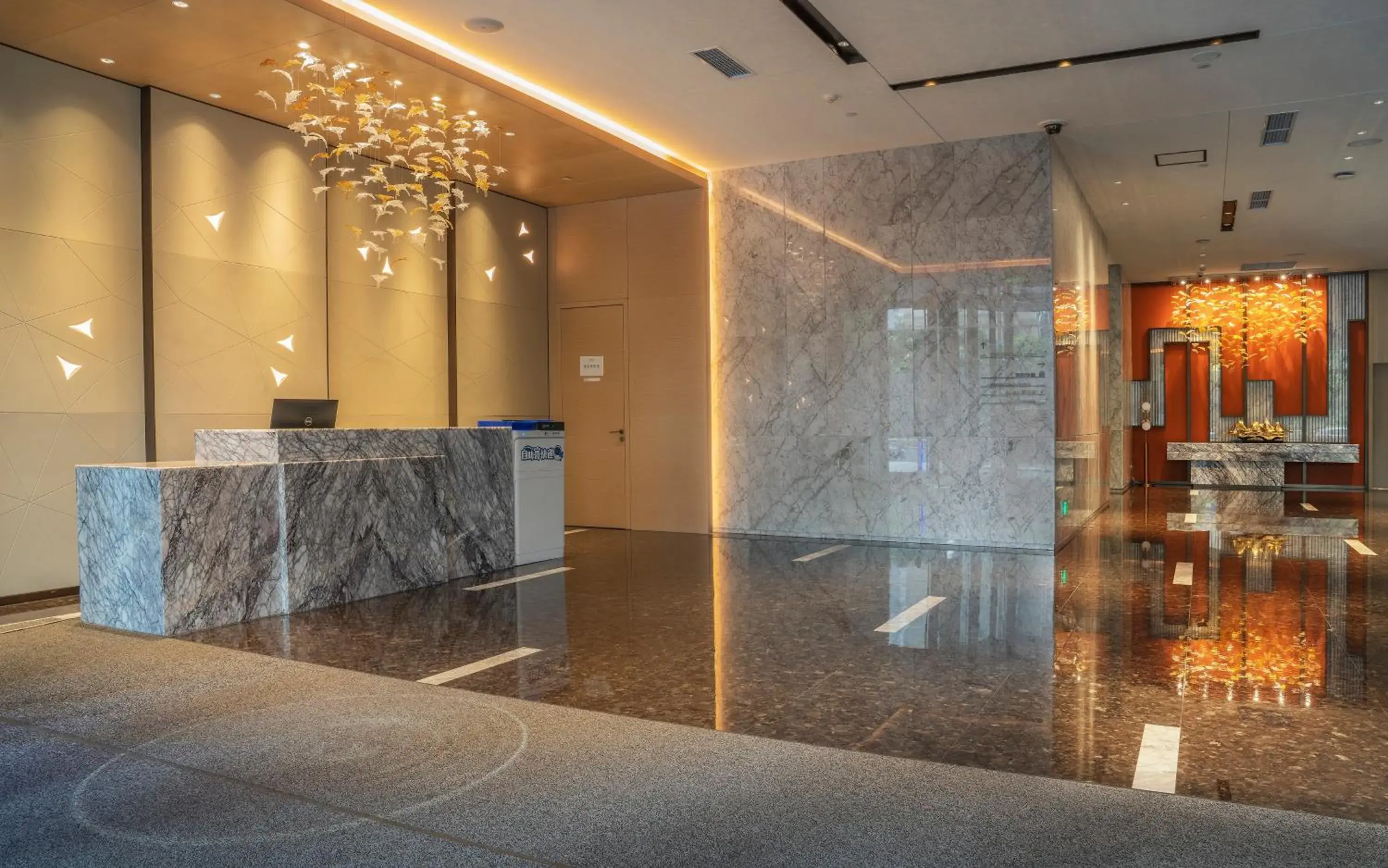 Lobby or reception in Crowne Plaza Changsha Development Zone by IHG Lobby or reception in Crowne Plaza Changsha Development Zone by IHG