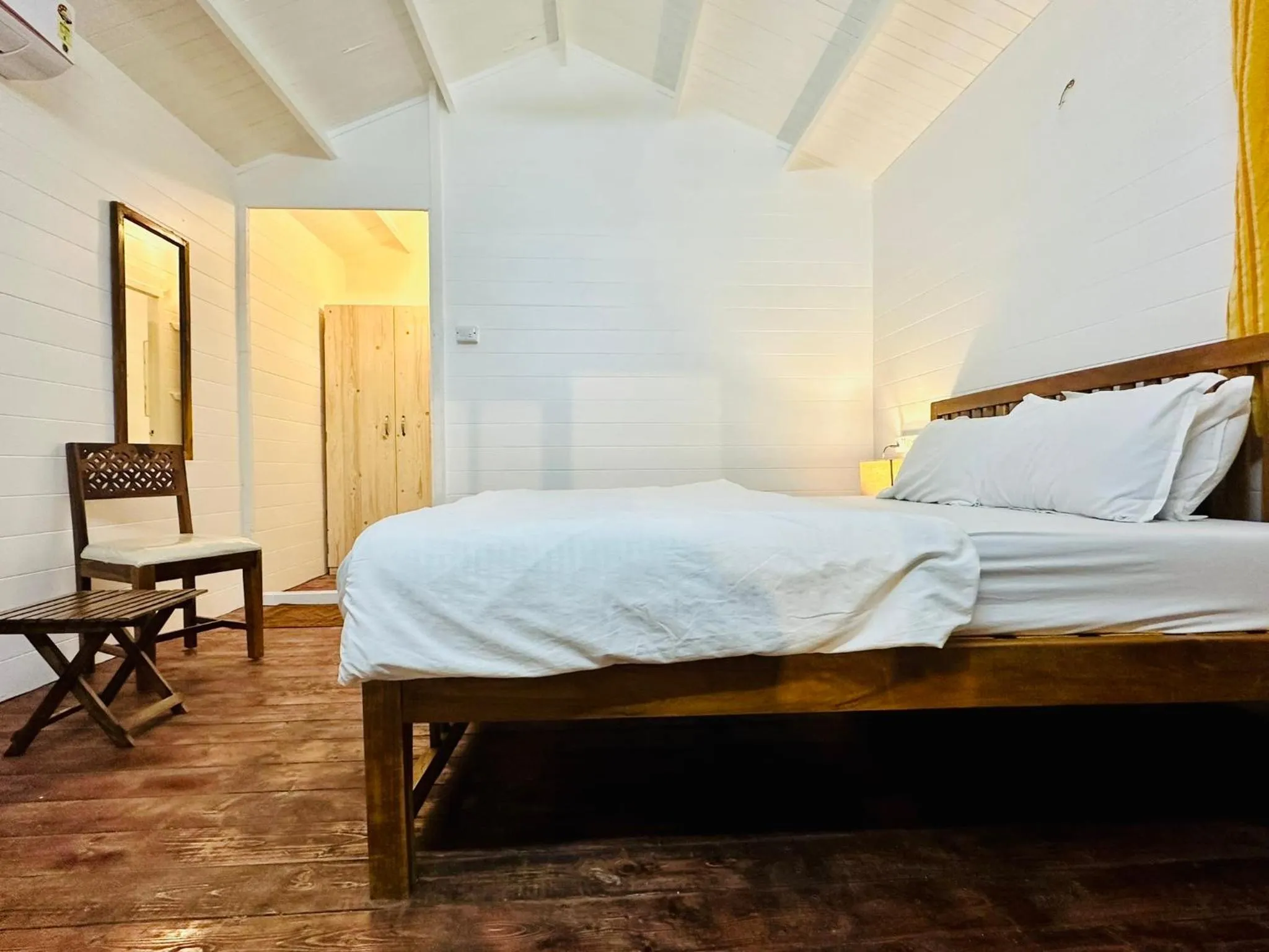 Bed in Cocos Beach Resort