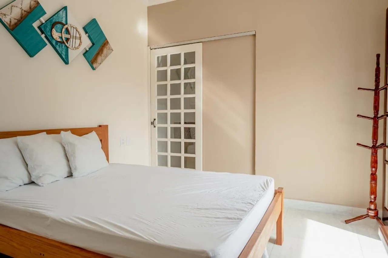 Bed in Pousada Oásis