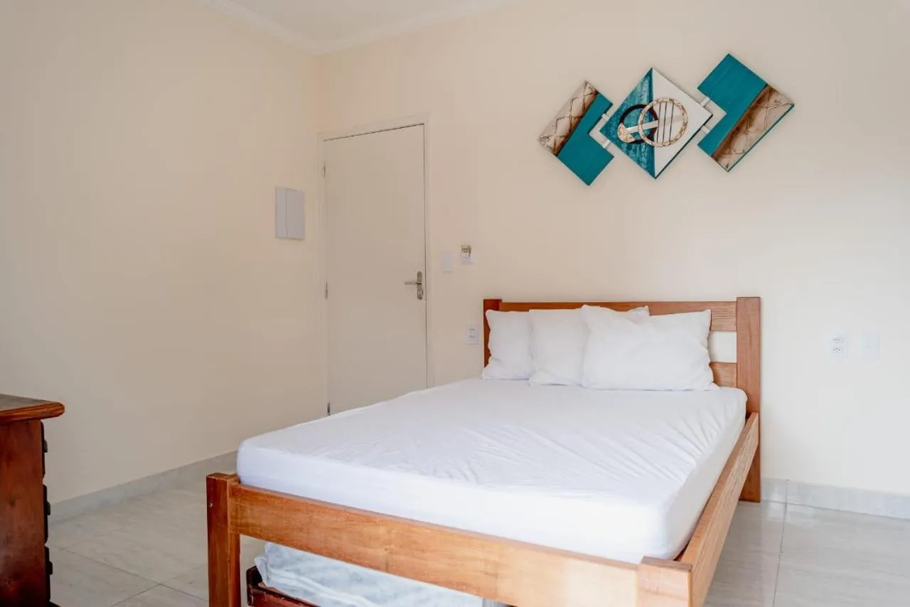 Bed in Pousada Oásis