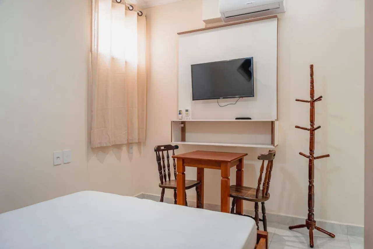 Bed in Pousada Oásis