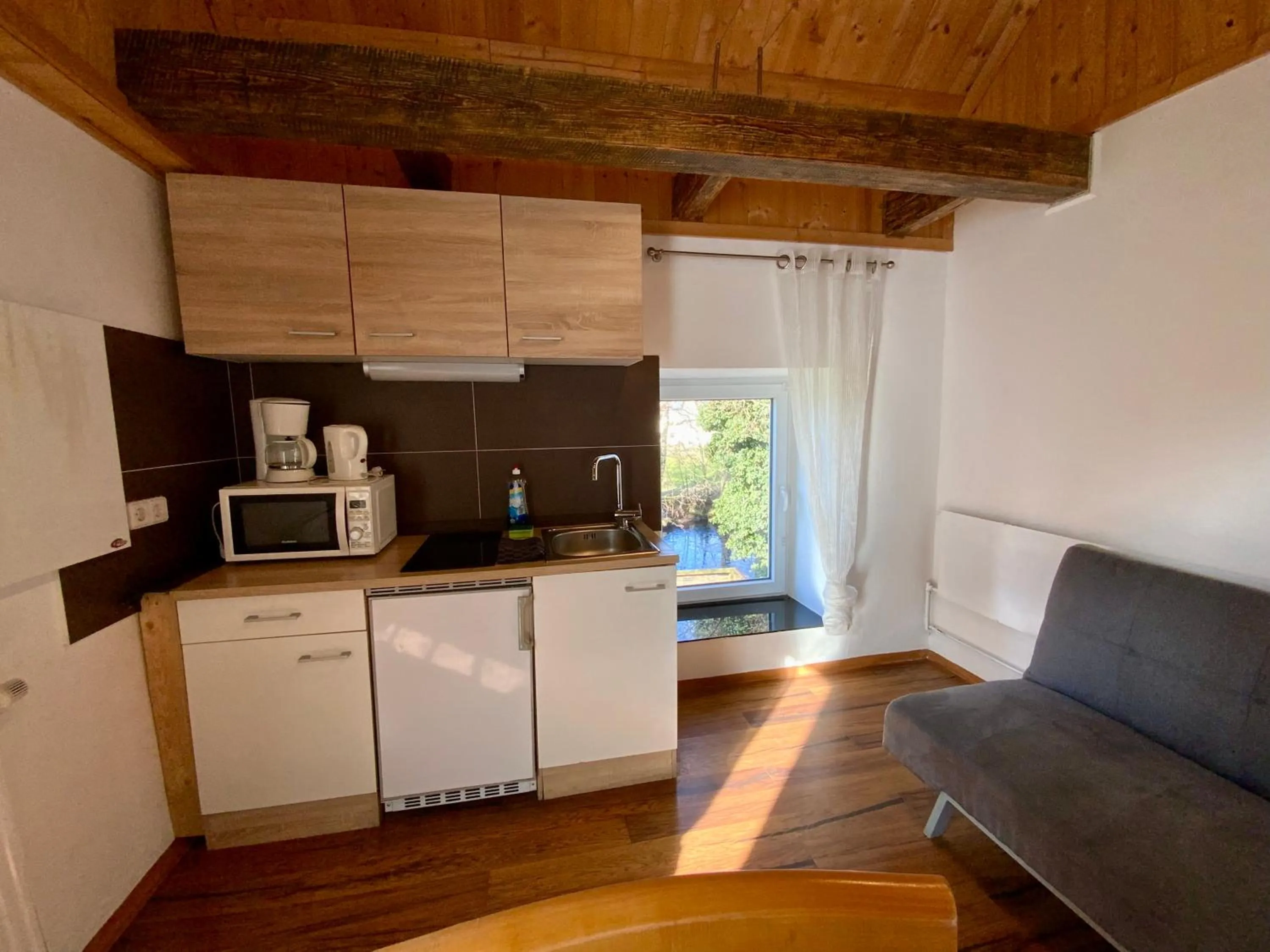 Kitchen or kitchenette in Geinberg Suites & Via Nova Lodges