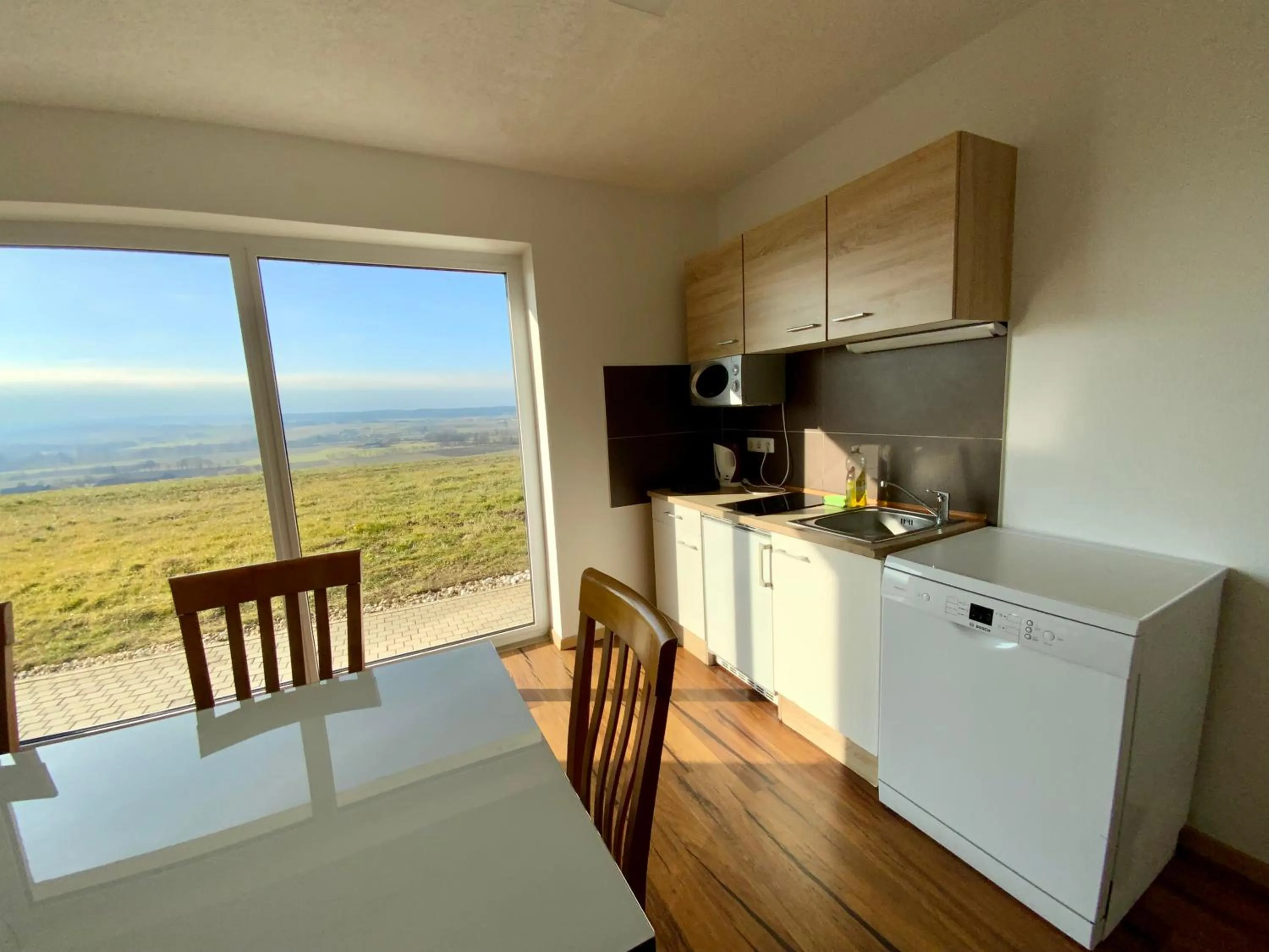 Kitchen or kitchenette in Geinberg Suites & Via Nova Lodges