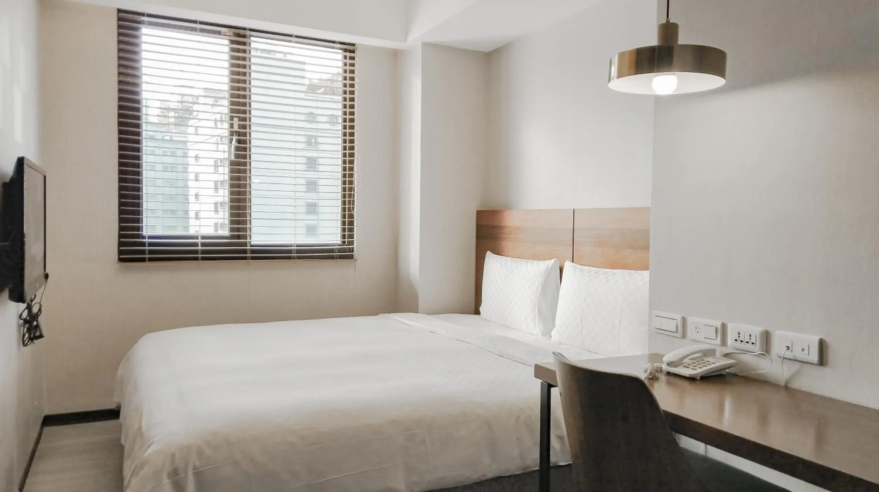 Bed in CHECK inn Express Taipei Station Bed in CHECK inn Express Taipei Station