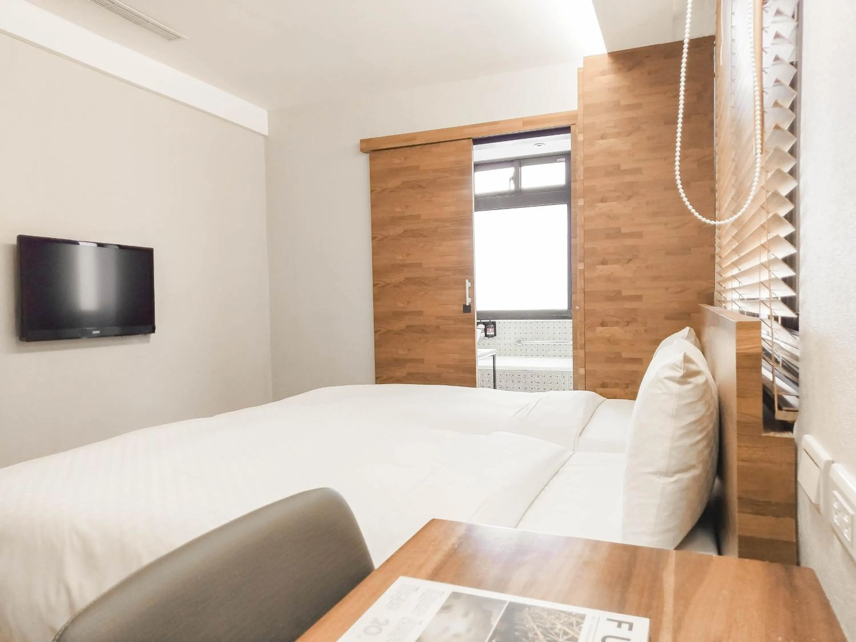 Bed in CHECK inn Express Taipei Station