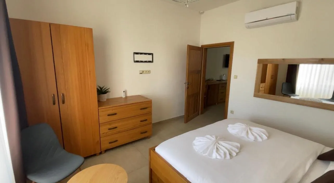 Kitchen or kitchenette, Bed in Hotel & wellness Hejtmanka