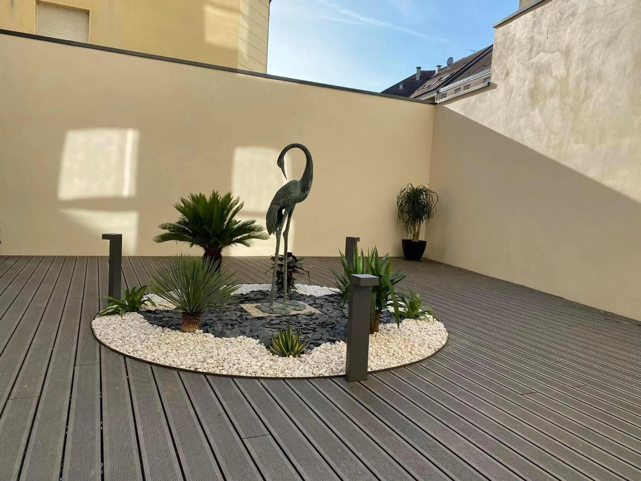 Patio in Hôtel - Restaurant Le MITIGANA