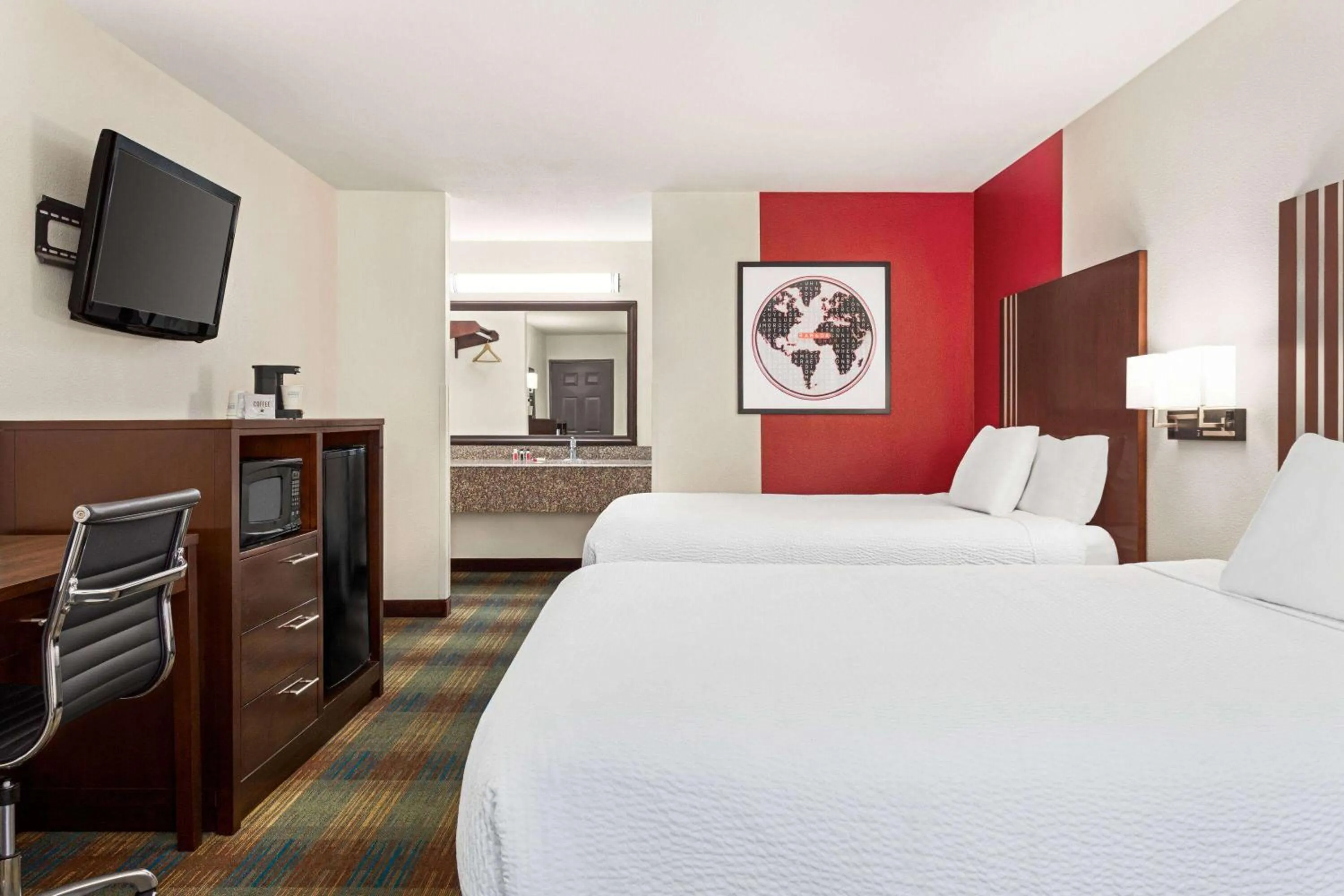 Photo of the whole room, Bed in Ramada by Wyndham San Antonio Near SeaWorld - Lackland AFB
