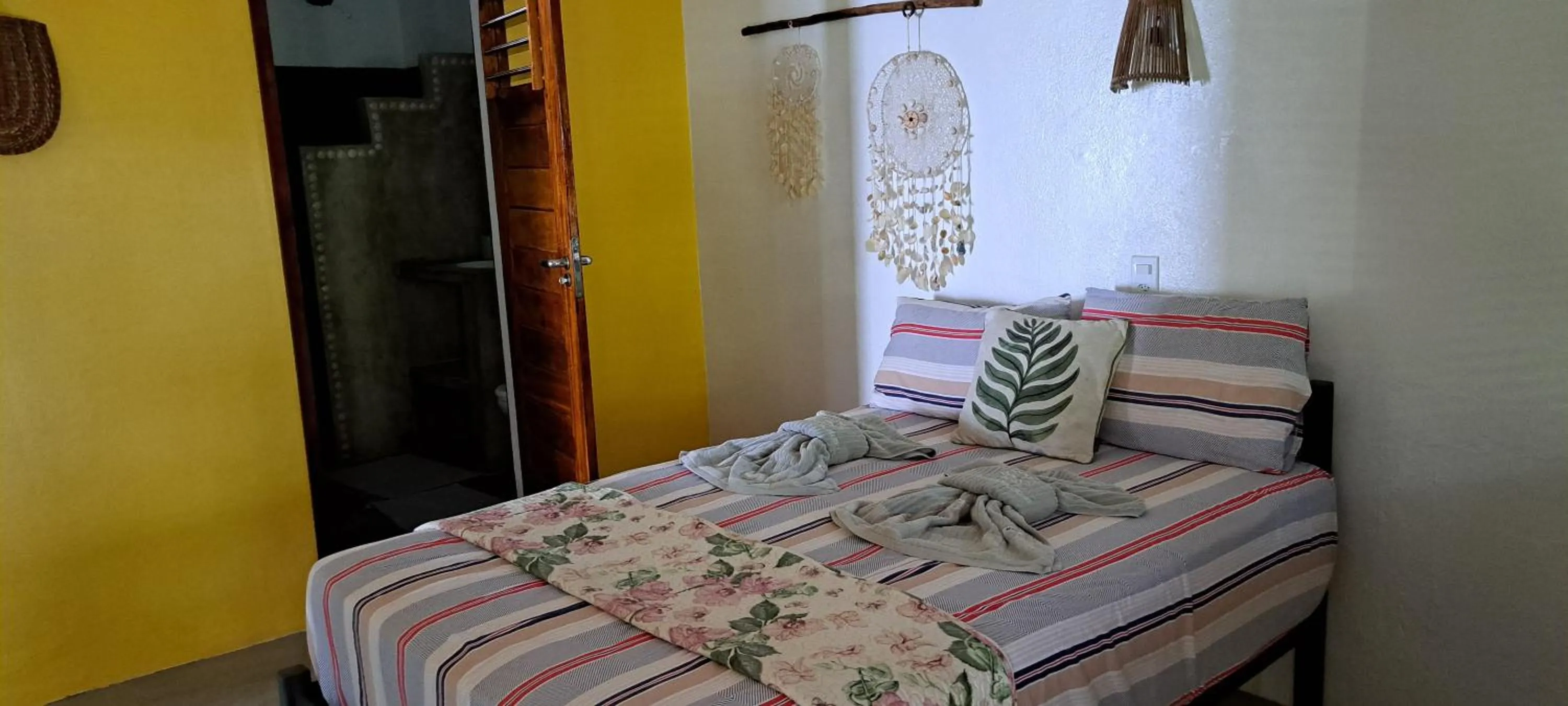 Bed in Pousada Lotus