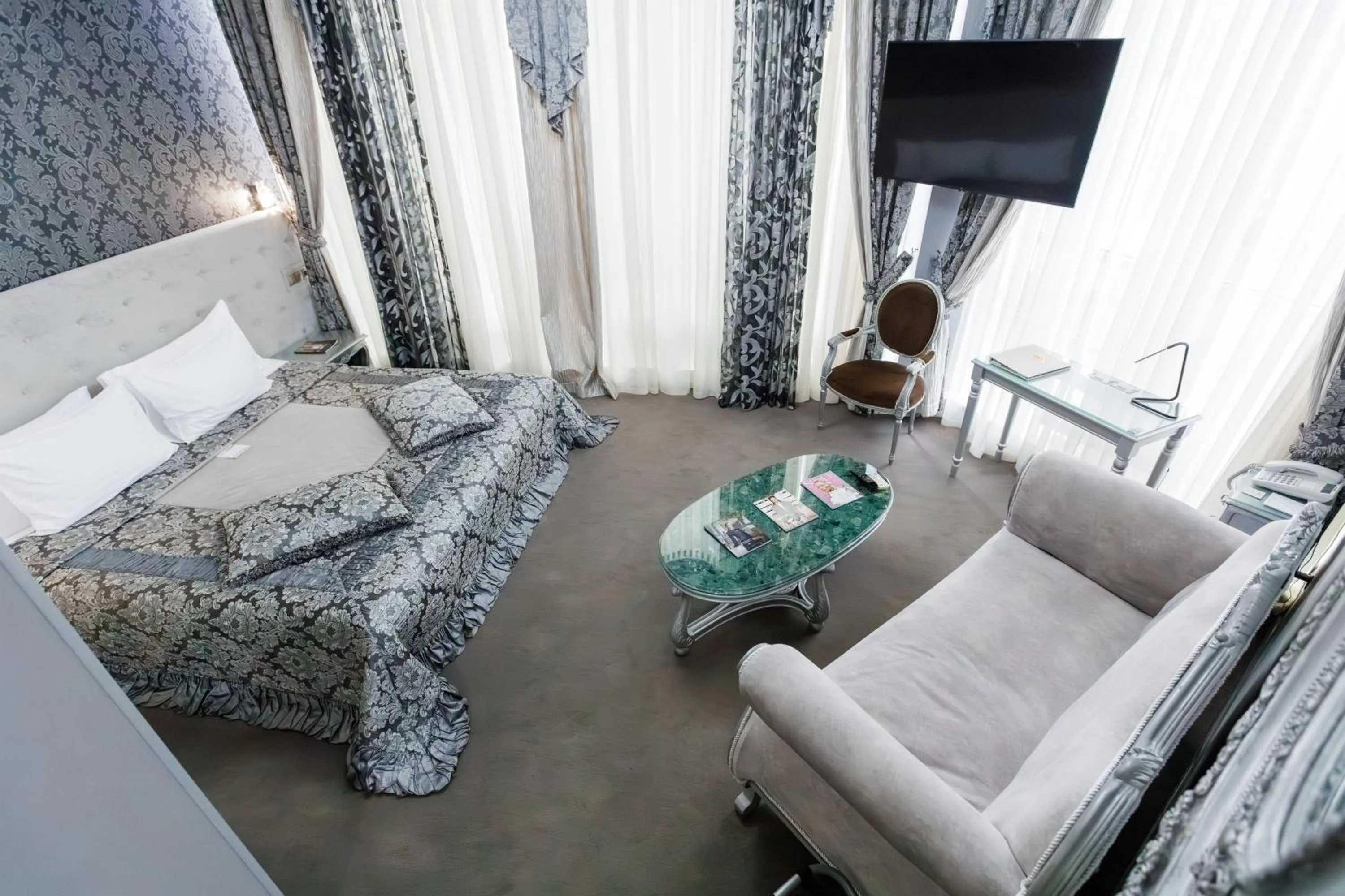 Bed in Boutique Spa Casino Hotel Lybid Plaza