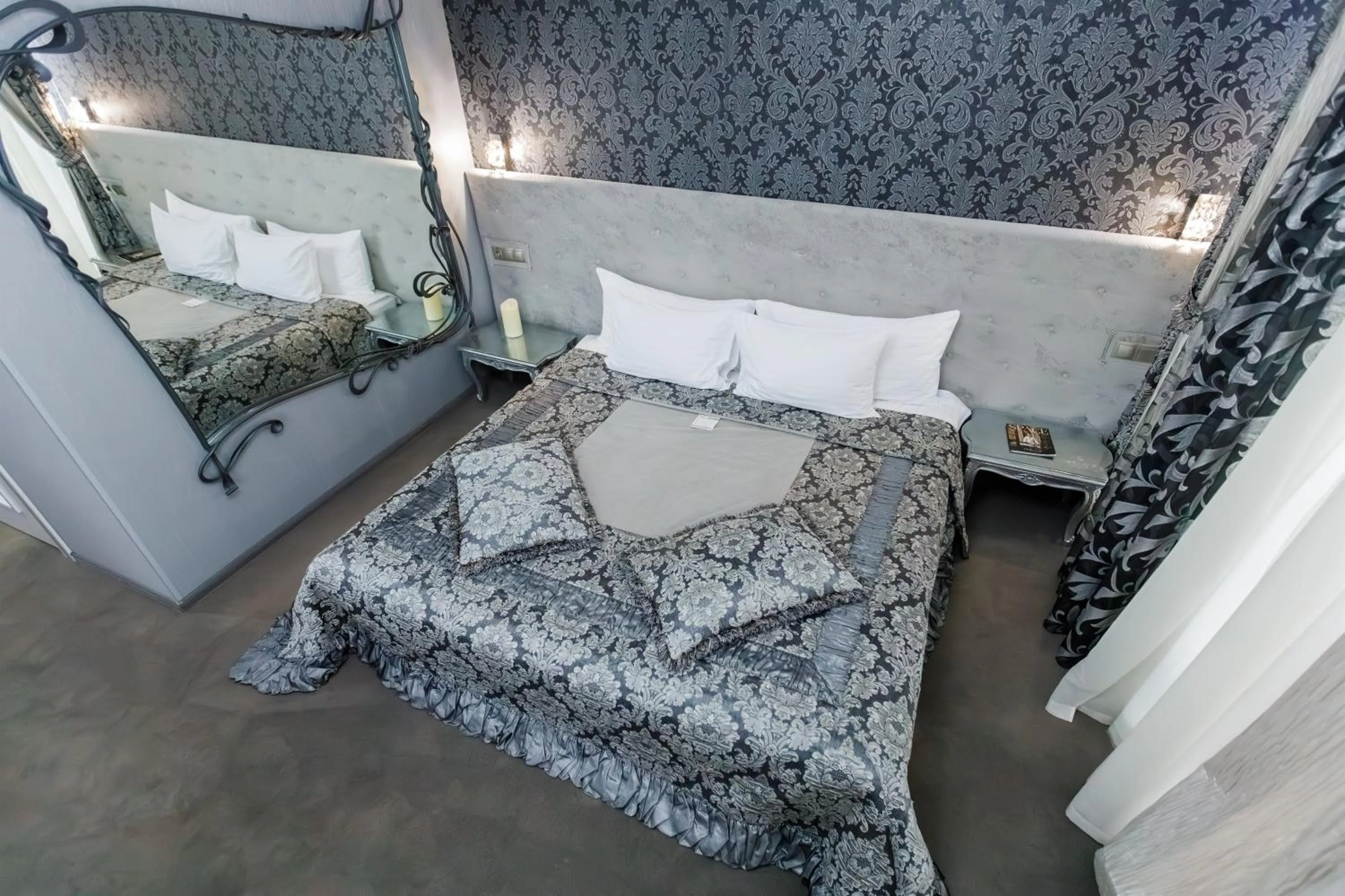 Bed in Boutique Spa Casino Hotel Lybid Plaza