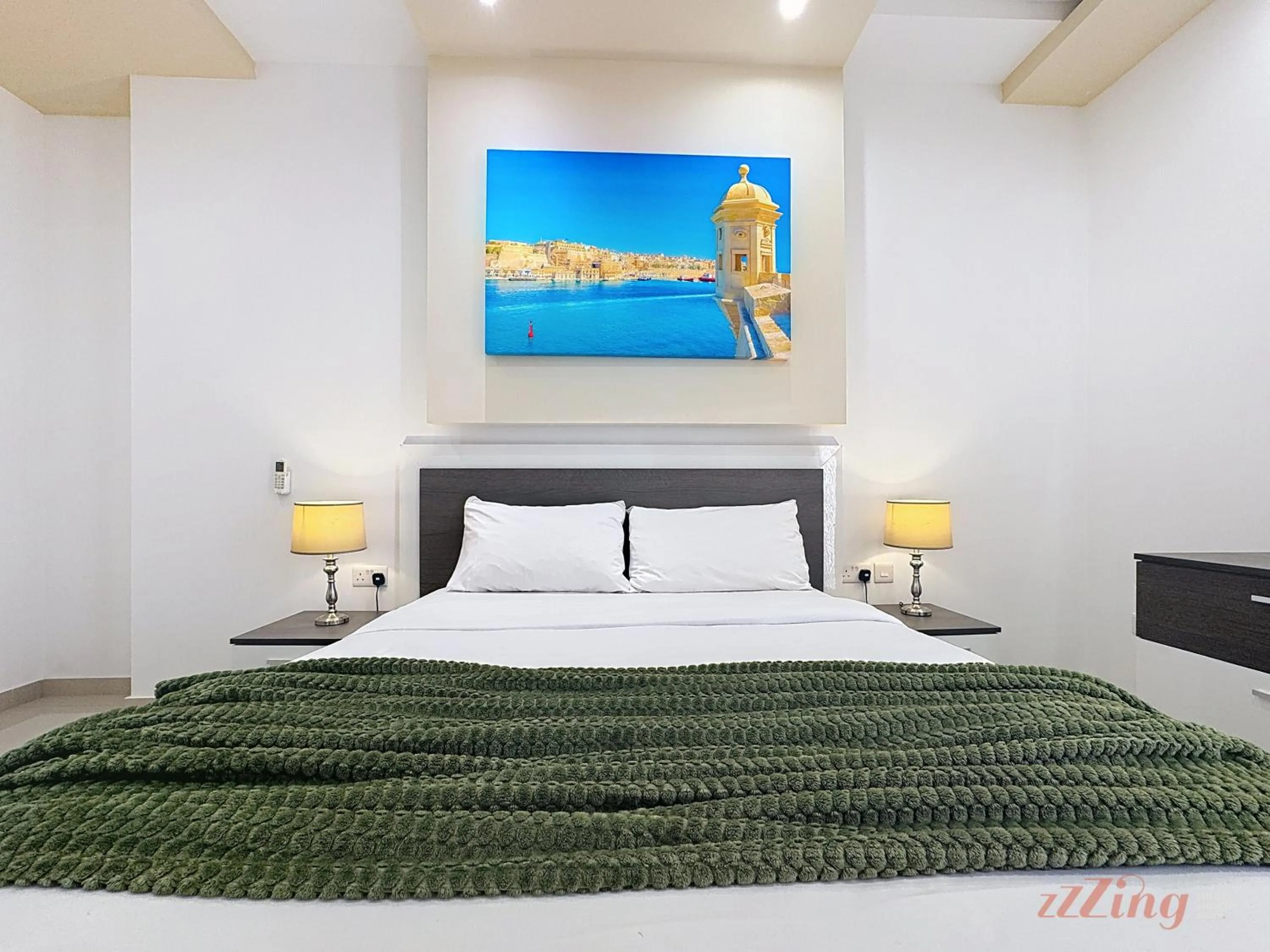 Bed in Elegant Seafront Duplex with Stunning Panoramic Views