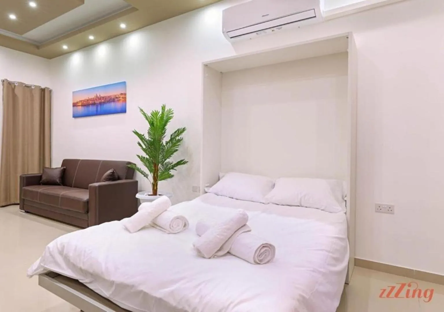 Bed in Elegant Seafront Duplex with Stunning Panoramic Views