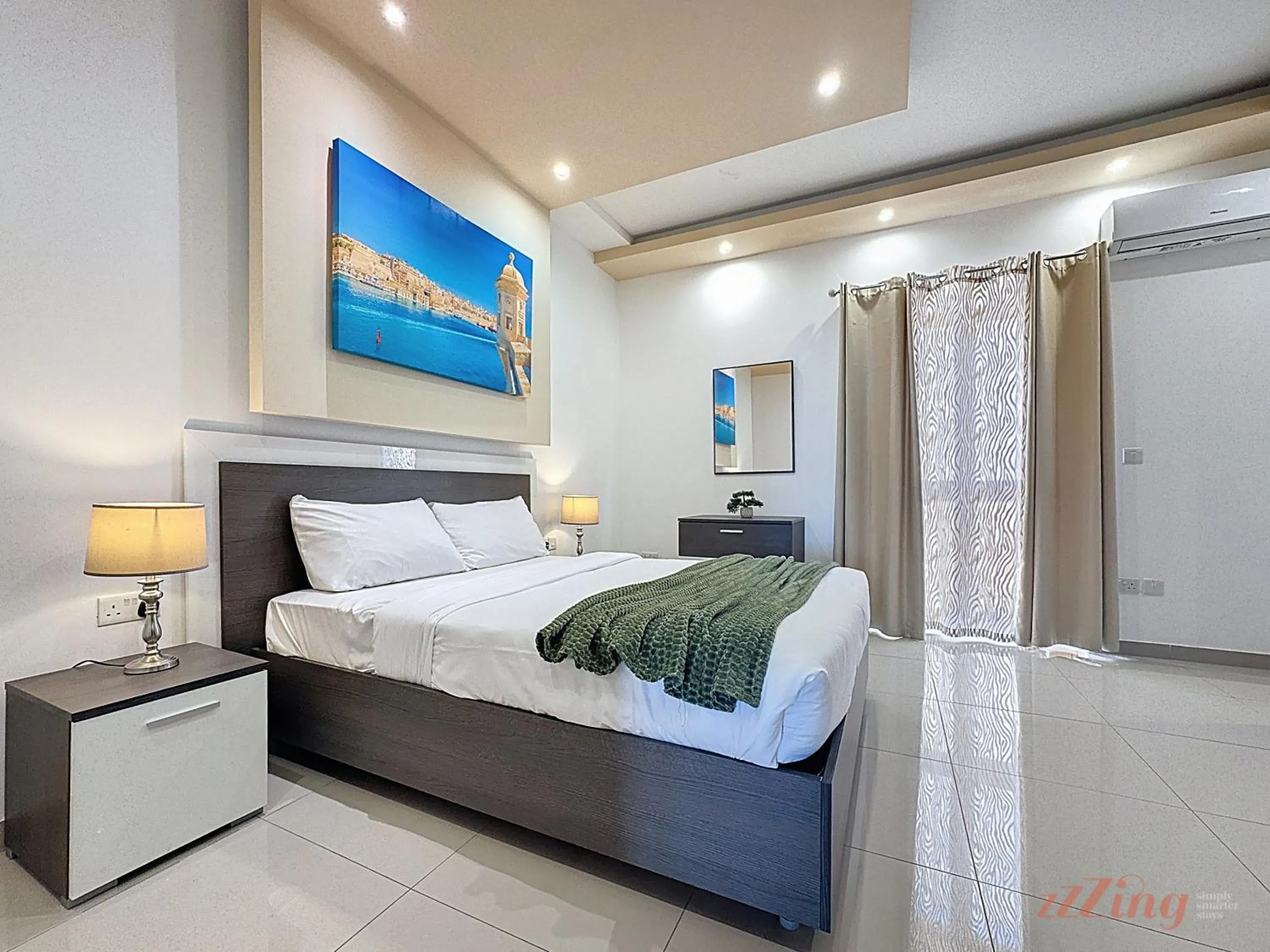 Bed in Elegant Seafront Duplex with Stunning Panoramic Views