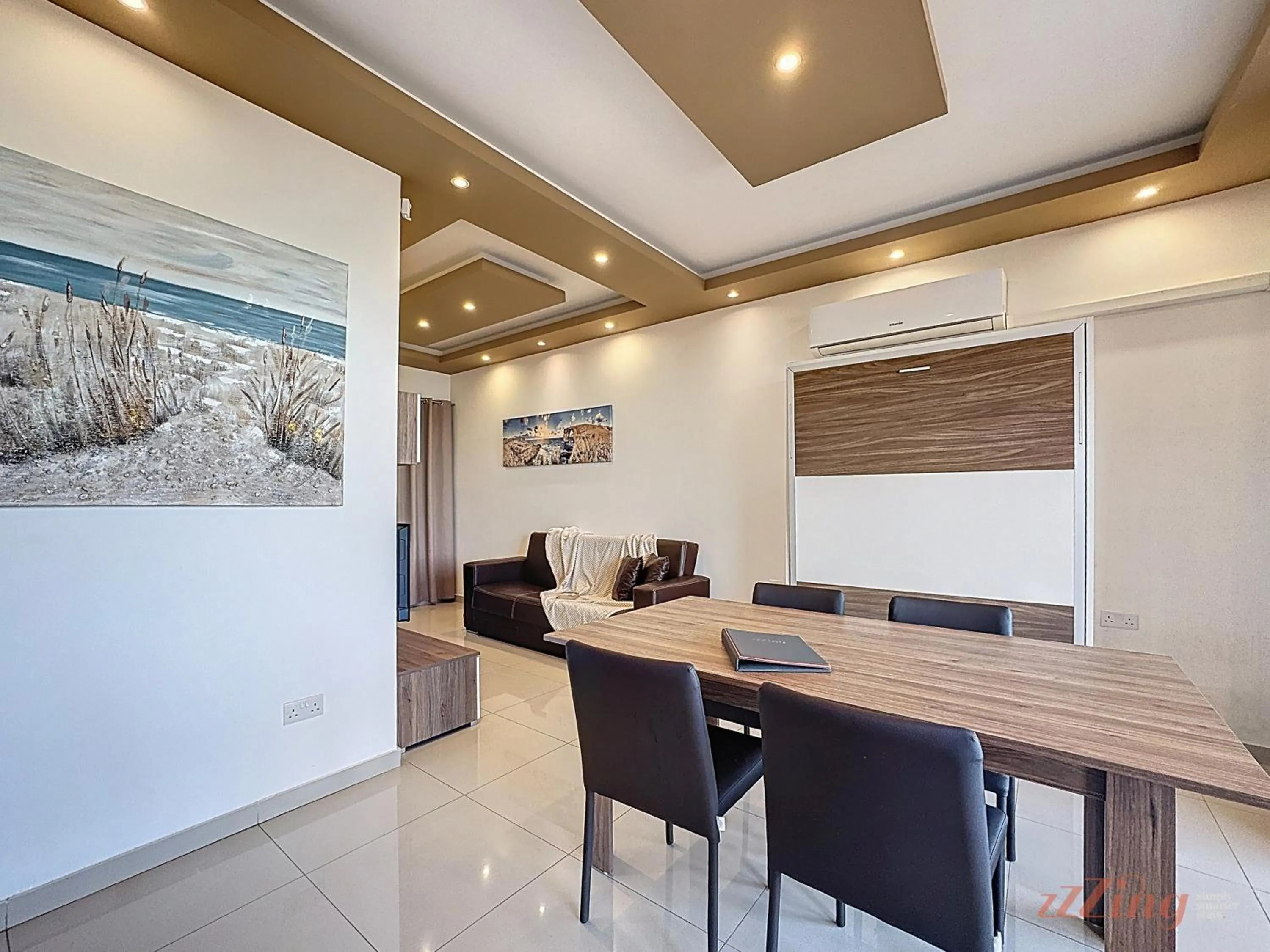Dining area in Elegant Seafront Duplex with Stunning Panoramic Views