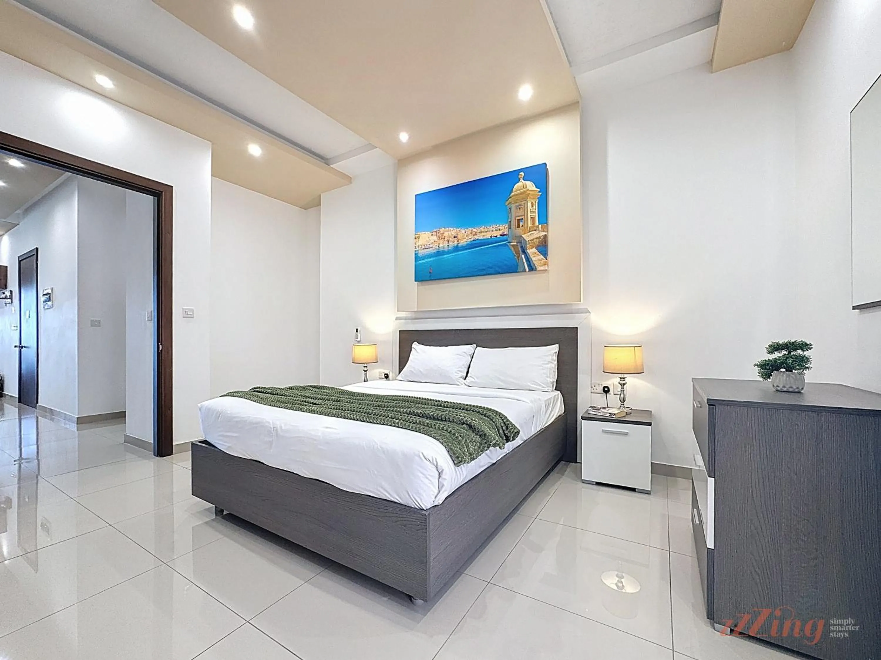 Bed in Elegant Seafront Duplex with Stunning Panoramic Views