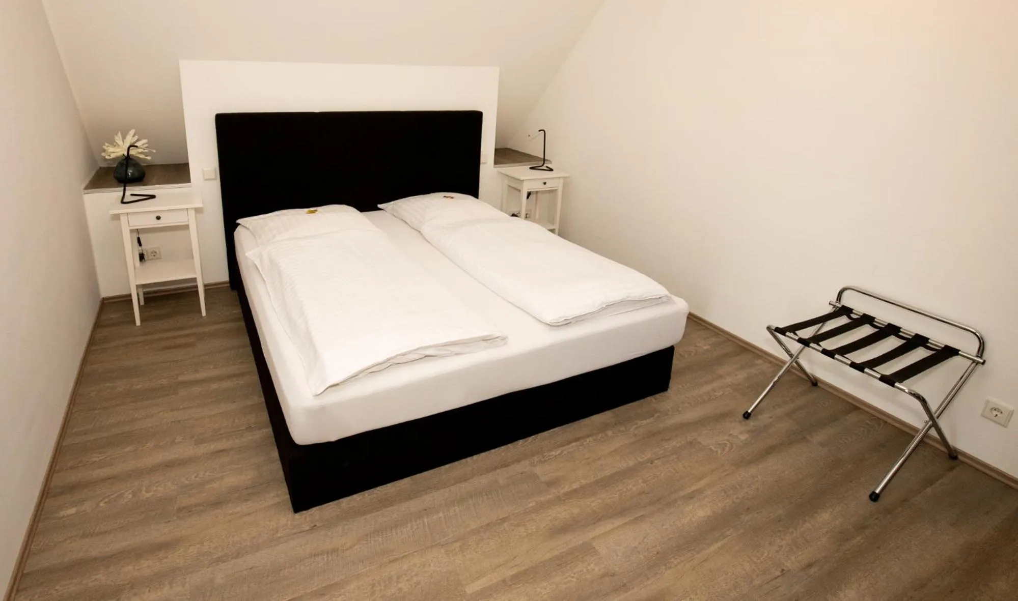 Photo of the whole room, Bed in Hotel Gut Grossrotter Hof (ehem. Hotel Schmitte)