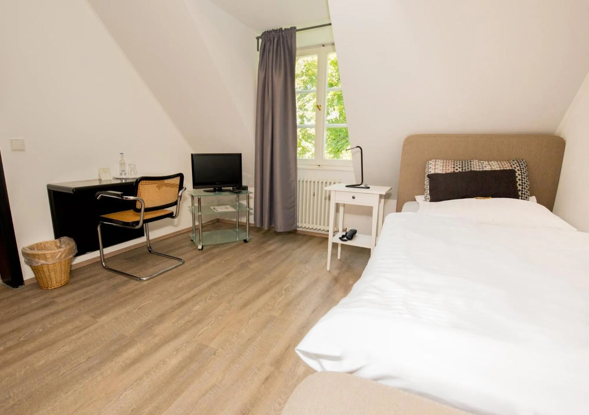 Photo of the whole room, Bed in Hotel Gut Grossrotter Hof (ehem. Hotel Schmitte)