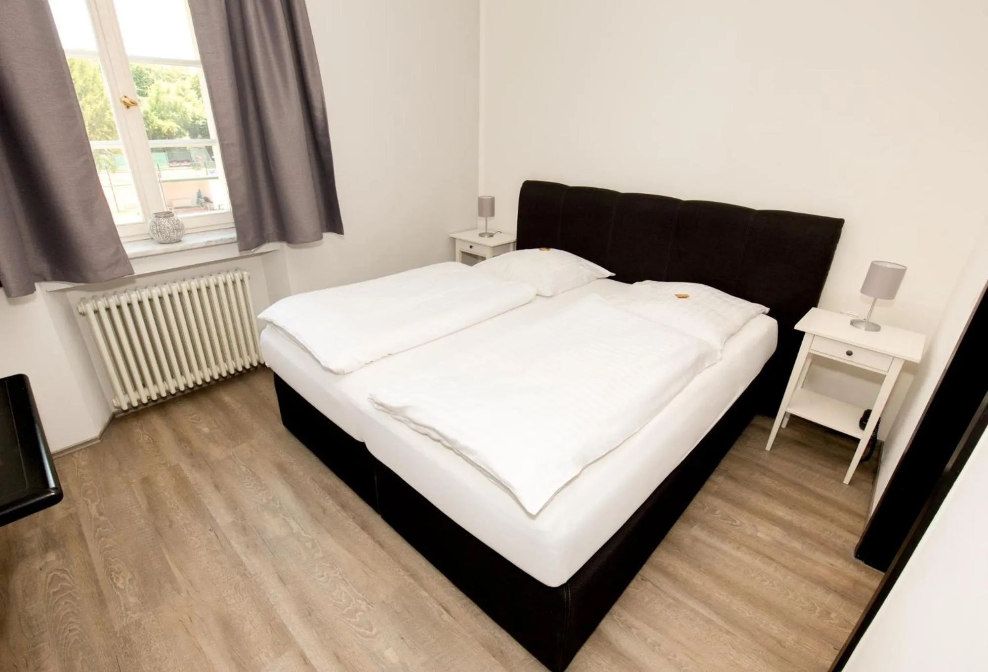 Photo of the whole room, Bed in Hotel Gut Grossrotter Hof (ehem. Hotel Schmitte)