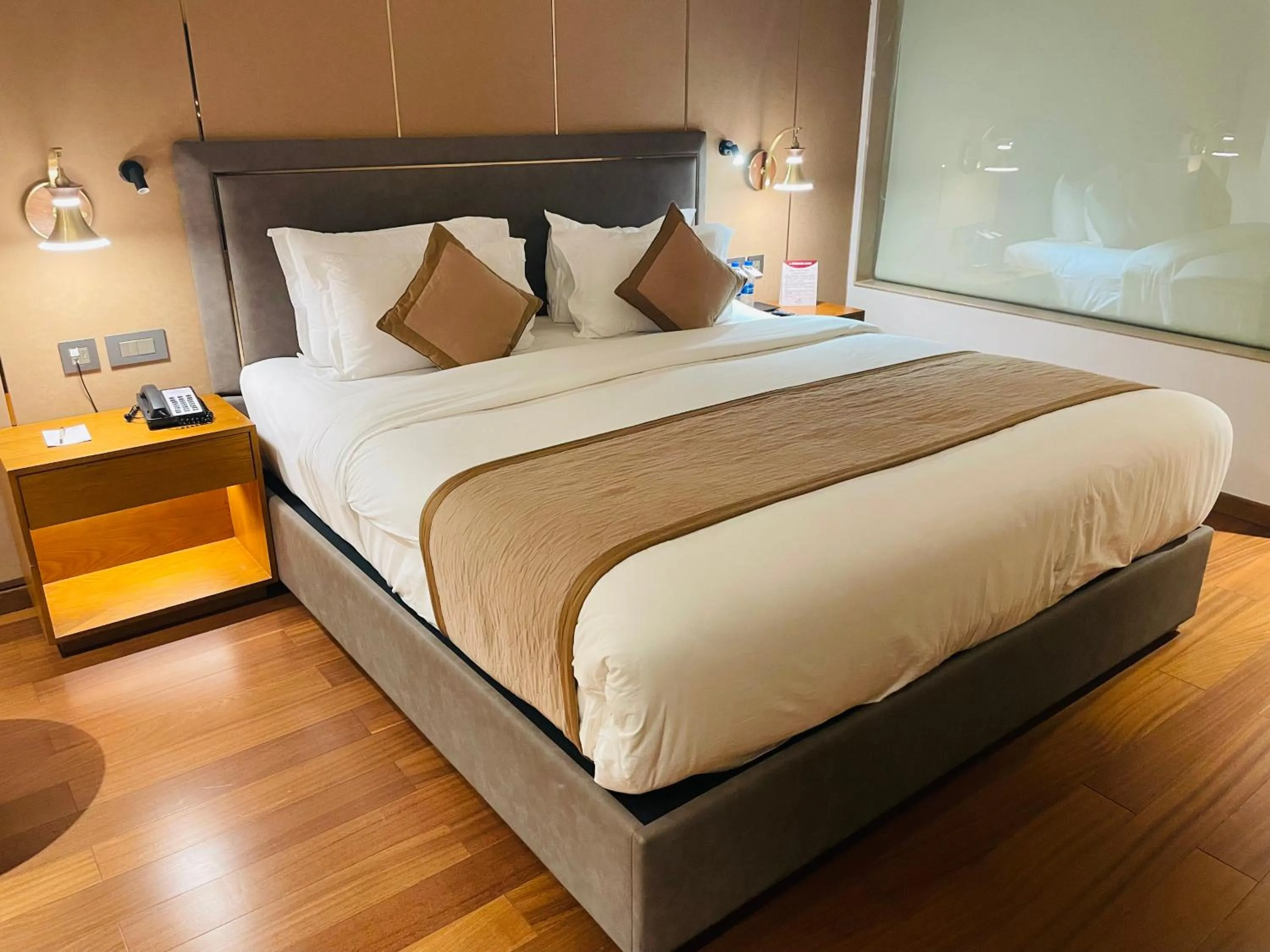 Photo of the whole room, Bed in Pride Hotel Udaipur