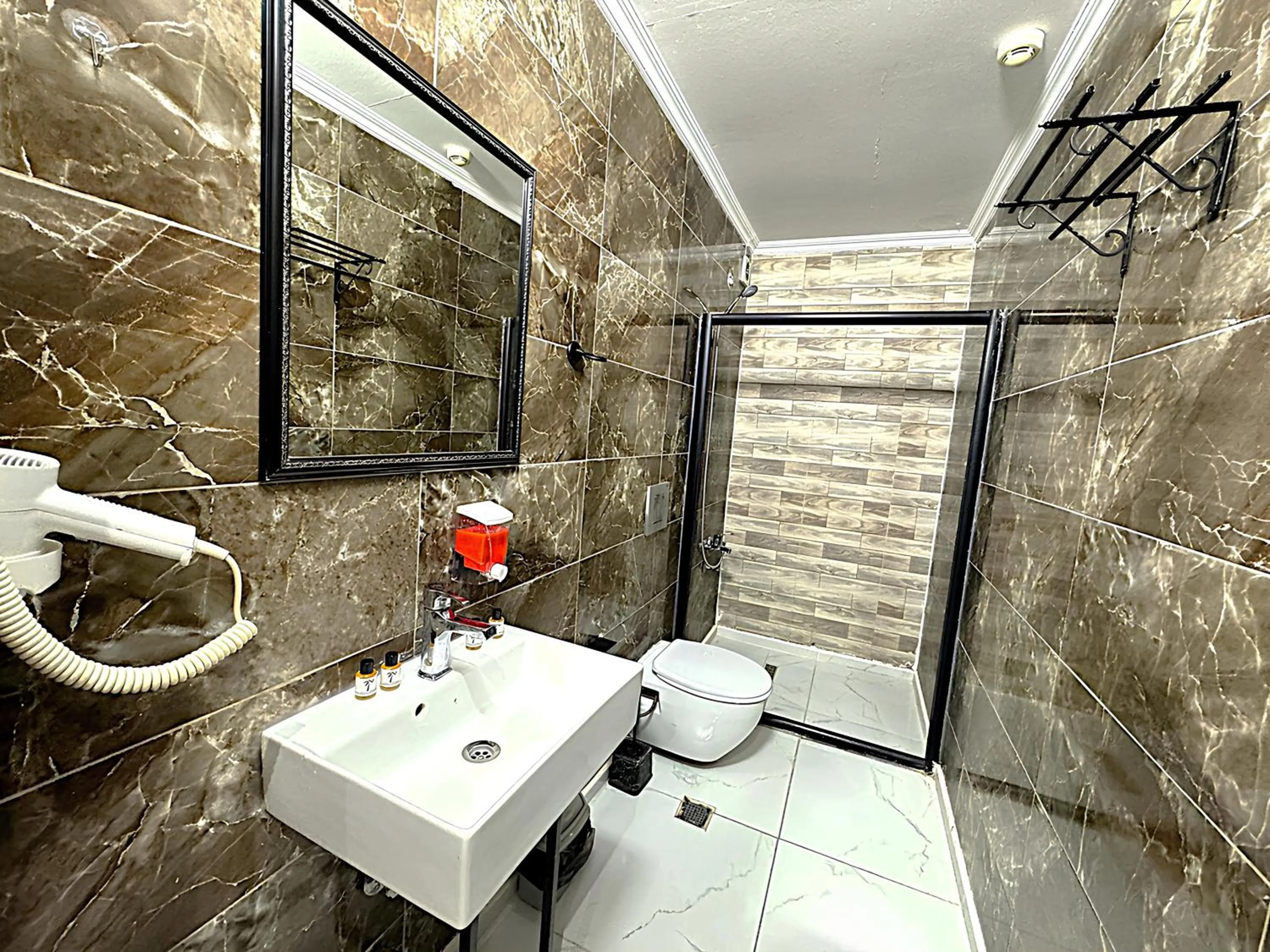Shower in Grand Lara Hotel & Apartments