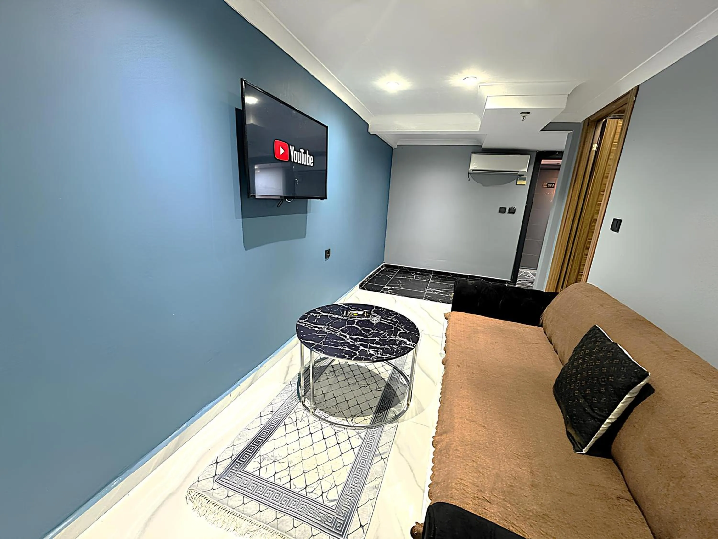 Bed in Grand Lara Hotel & Apartments