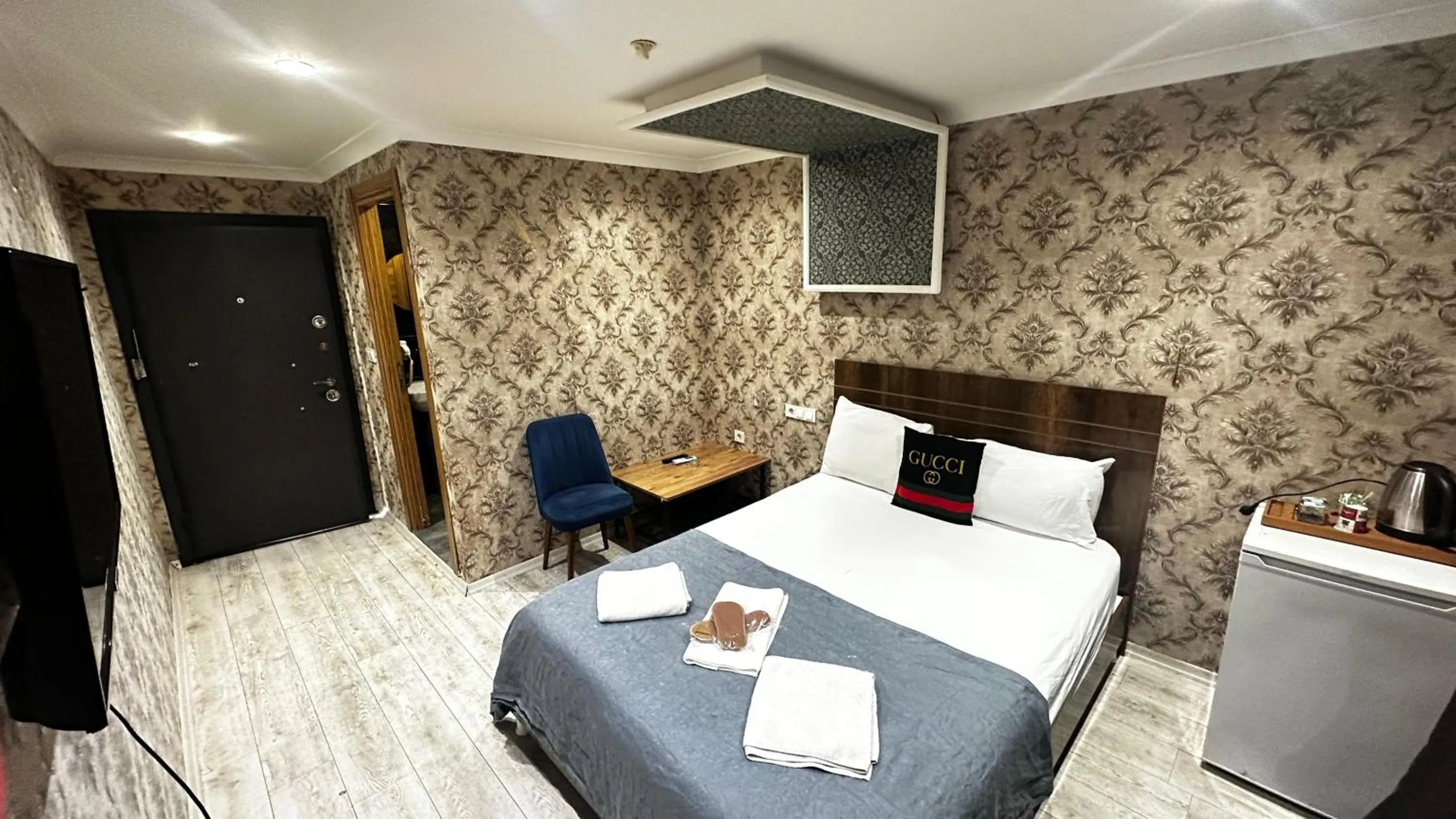 Bed in Grand Lara Hotel & Apartments