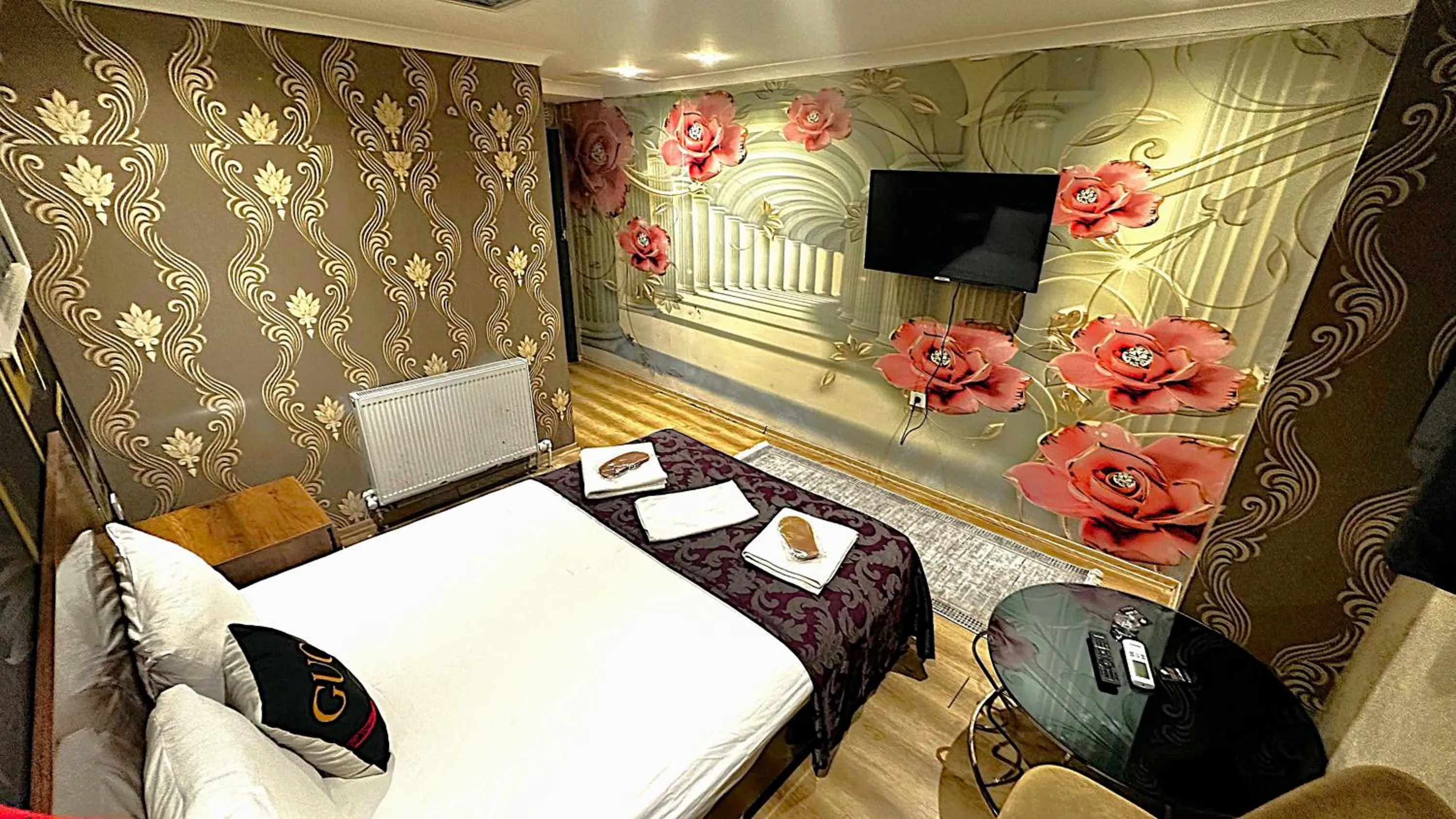 Bed in Grand Lara Hotel & Apartments