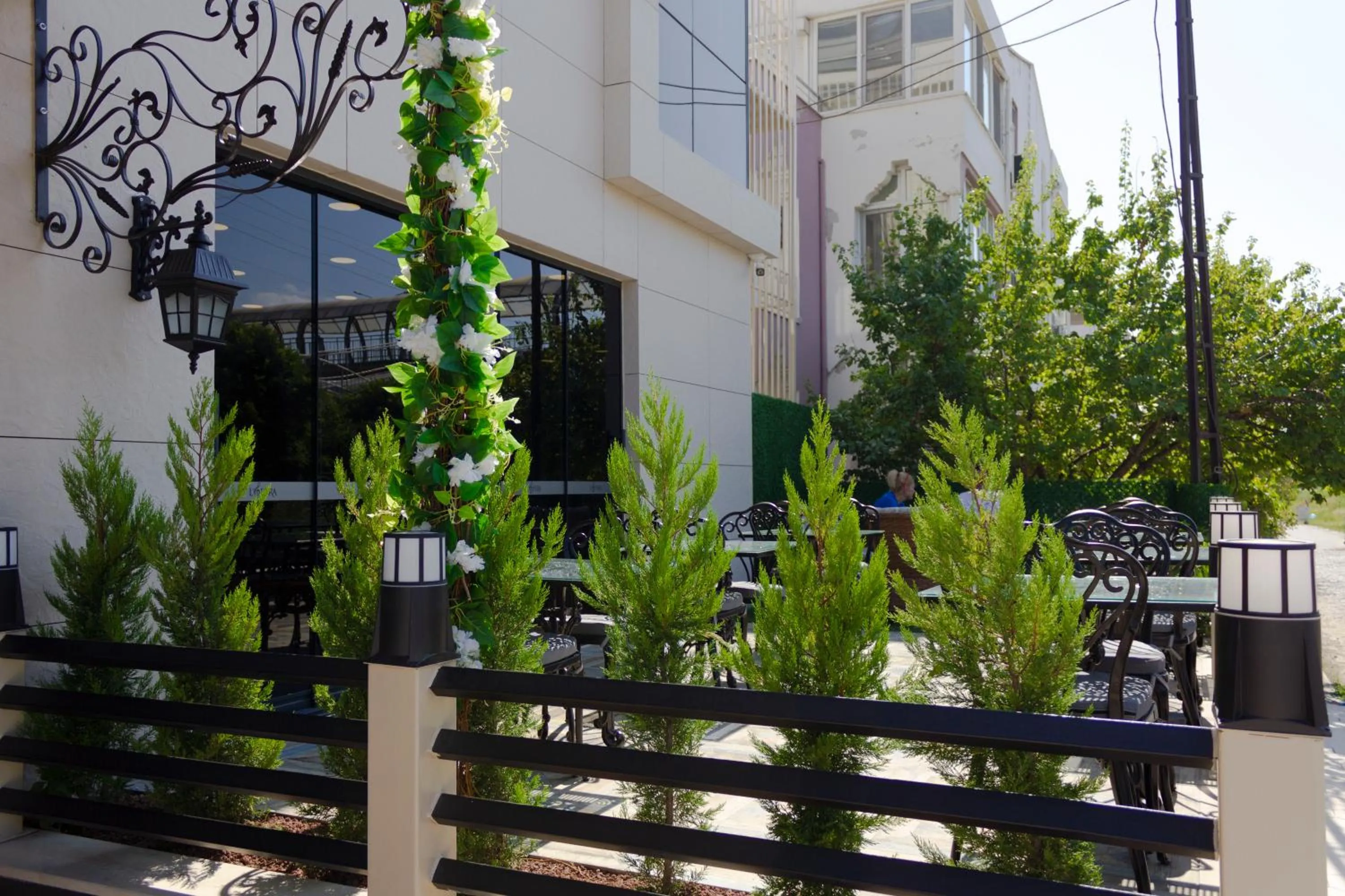 Patio in L'opera Deluxe Hotel