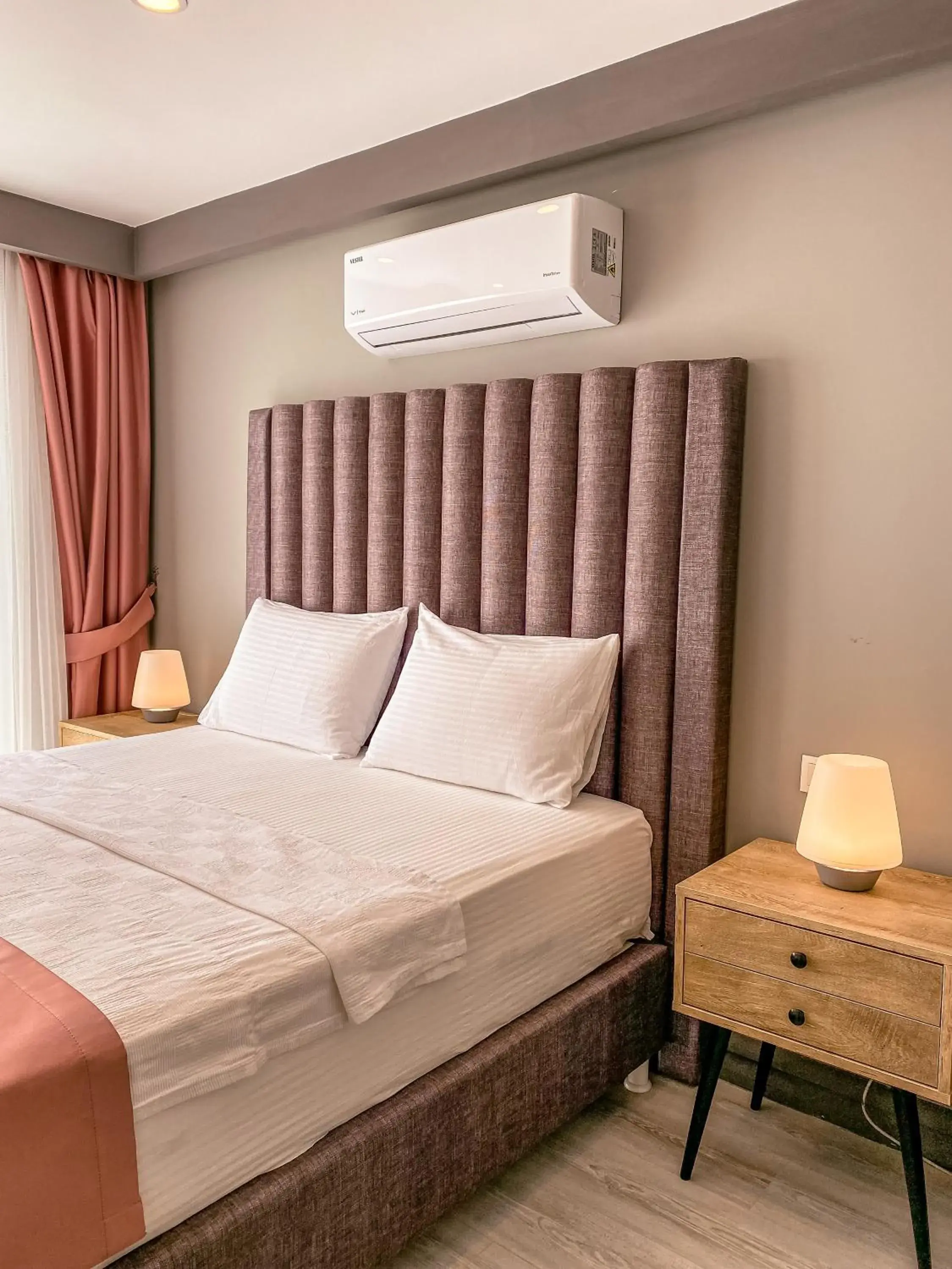 Bed in L'opera Deluxe Hotel Bed in L'opera Deluxe Hotel