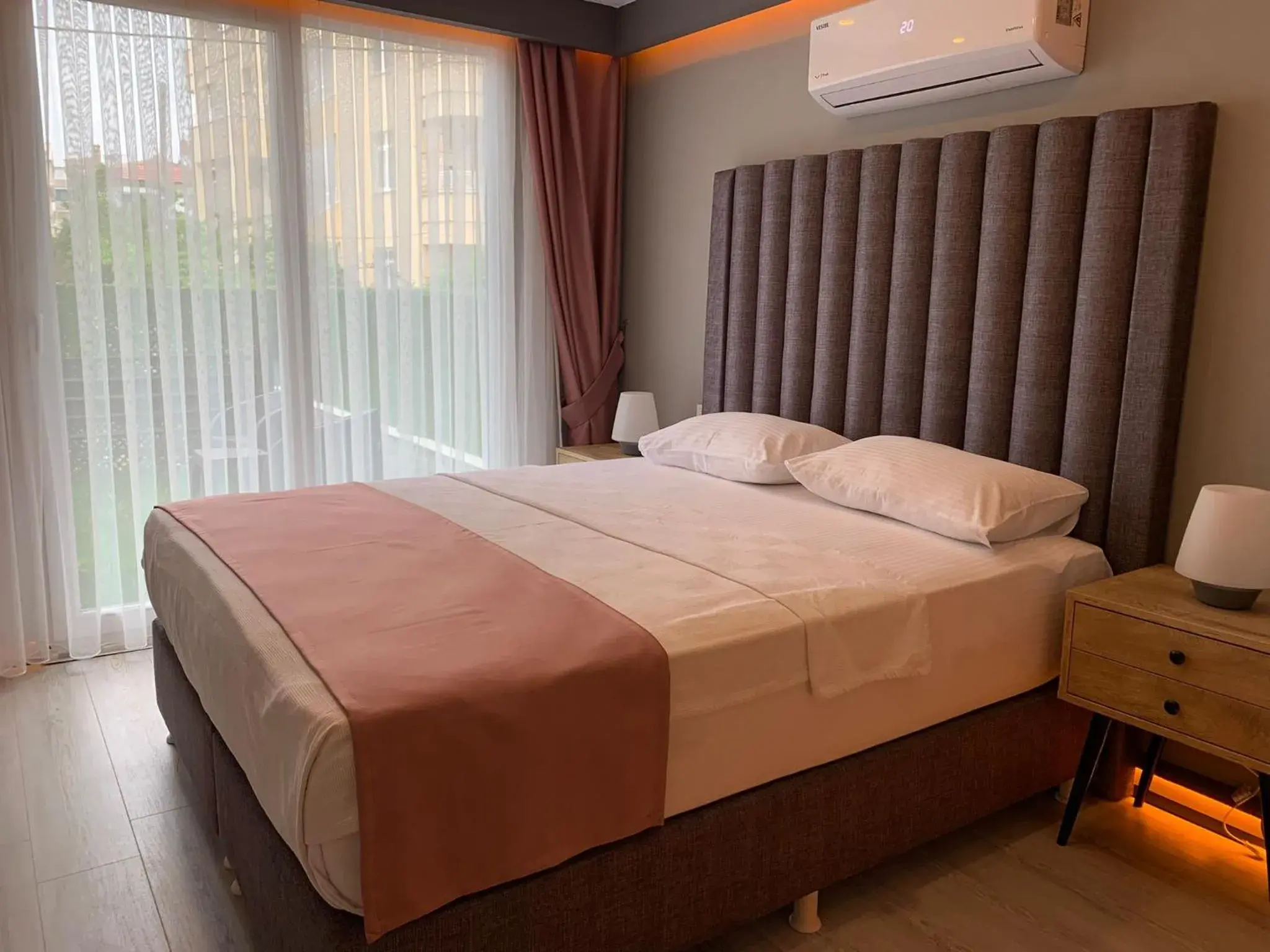 Bed in L'opera Deluxe Hotel Bed in L'opera Deluxe Hotel