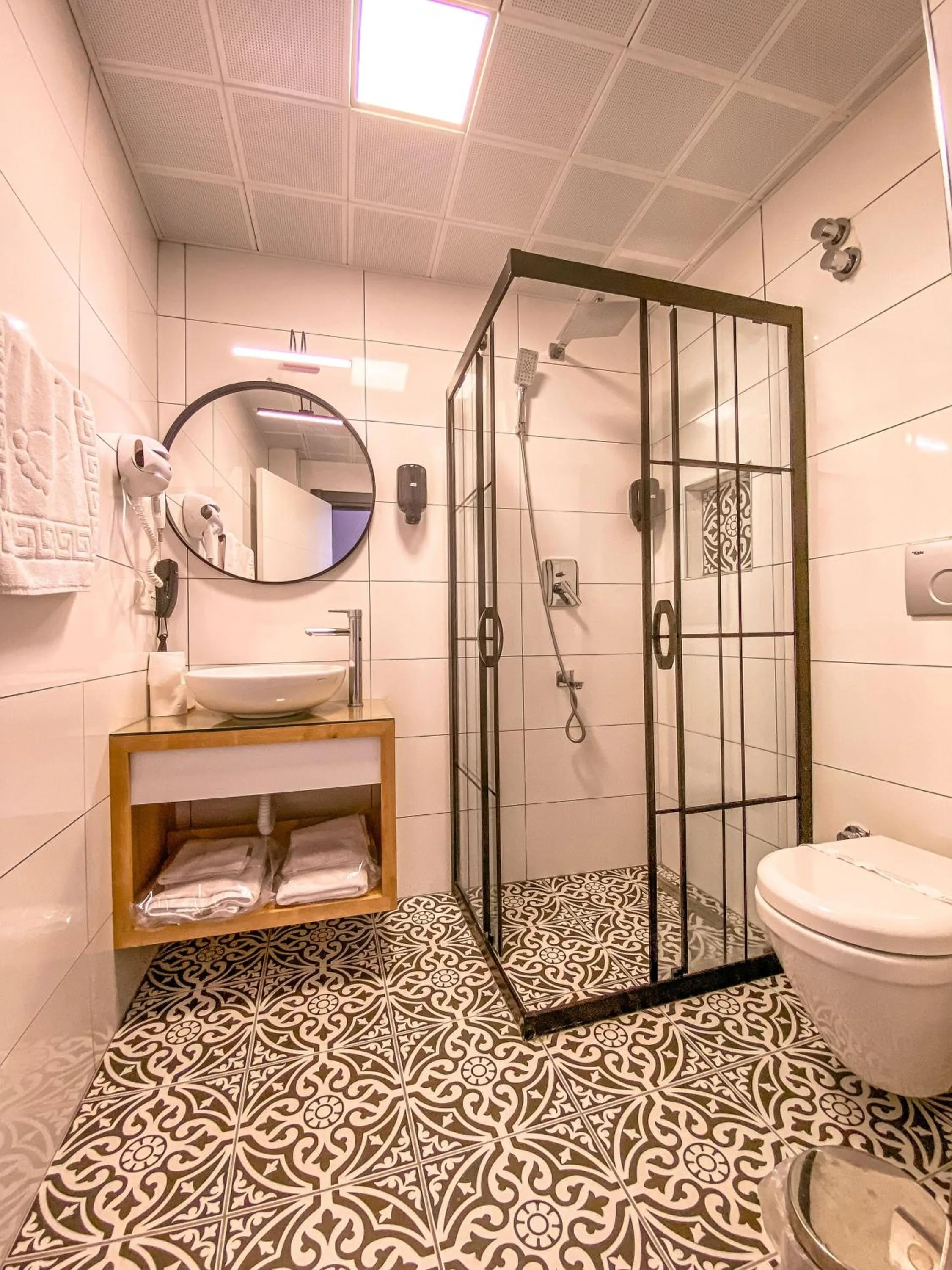 Bathroom in L'opera Deluxe Hotel